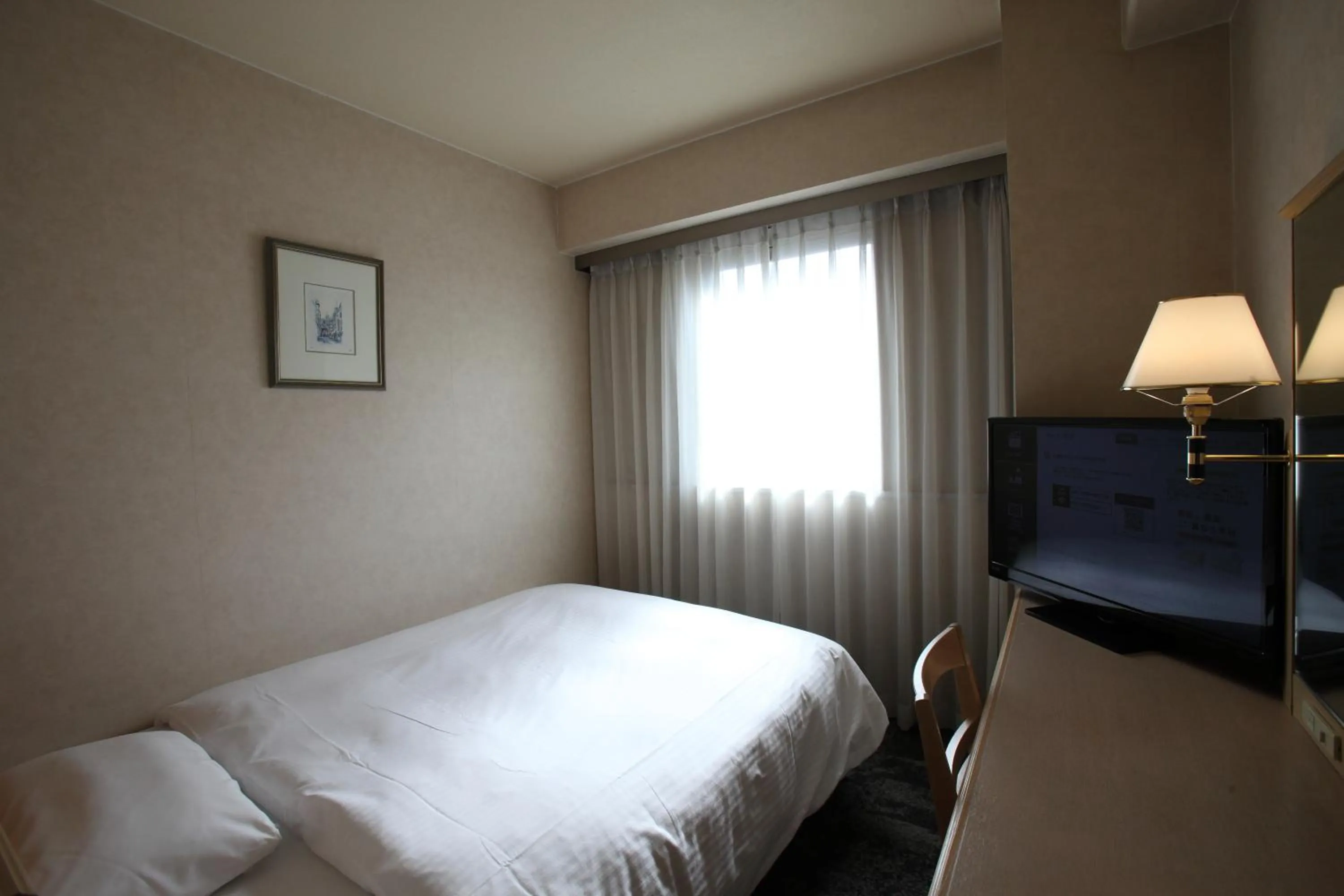 Photo of the whole room, Bed in Kurume Washington Hotel Plaza