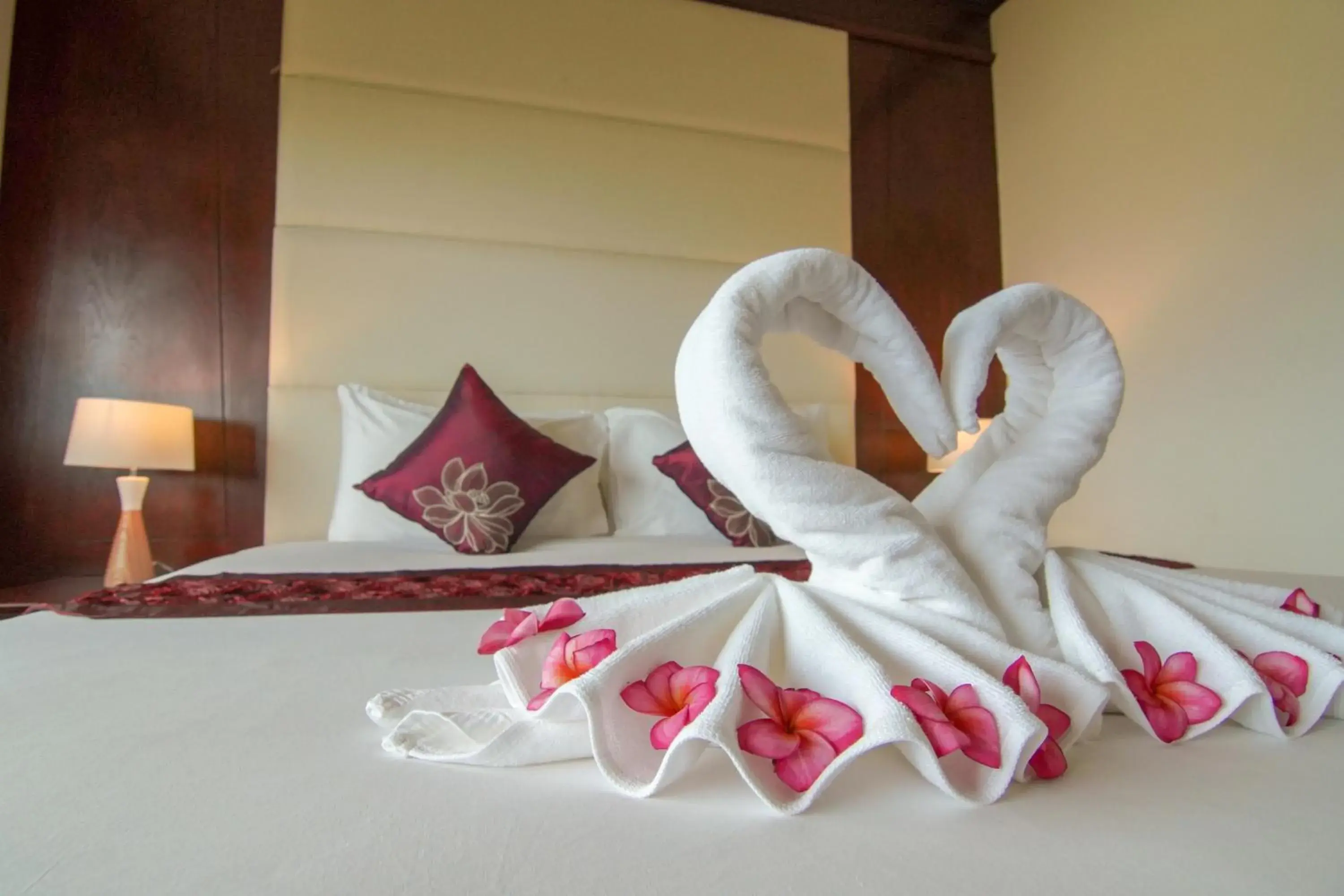 Bed in Arawan Riverside Hotel Bed in Arawan Riverside Hotel