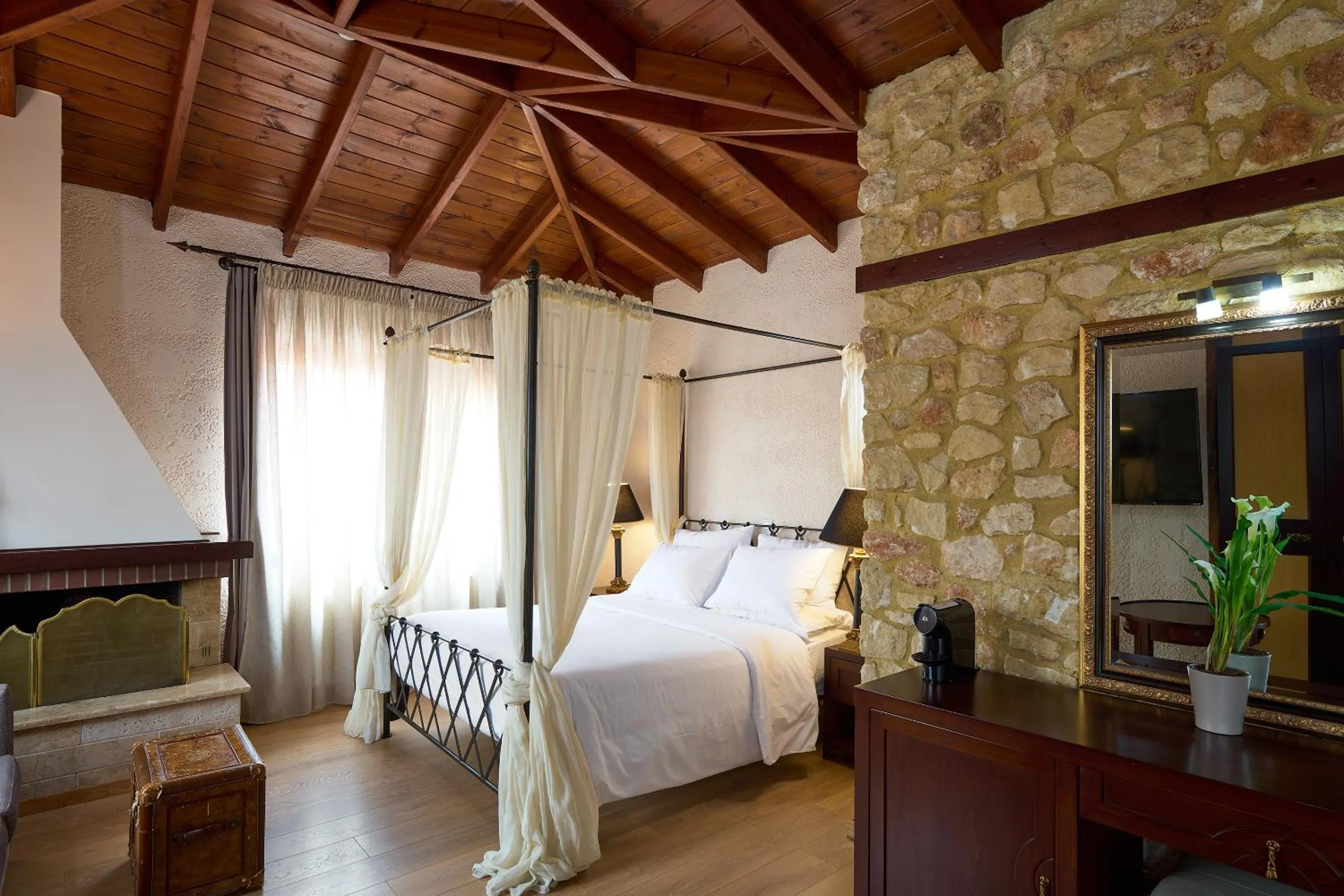 Bed in Olympus Mediterranean Boutique Hotel