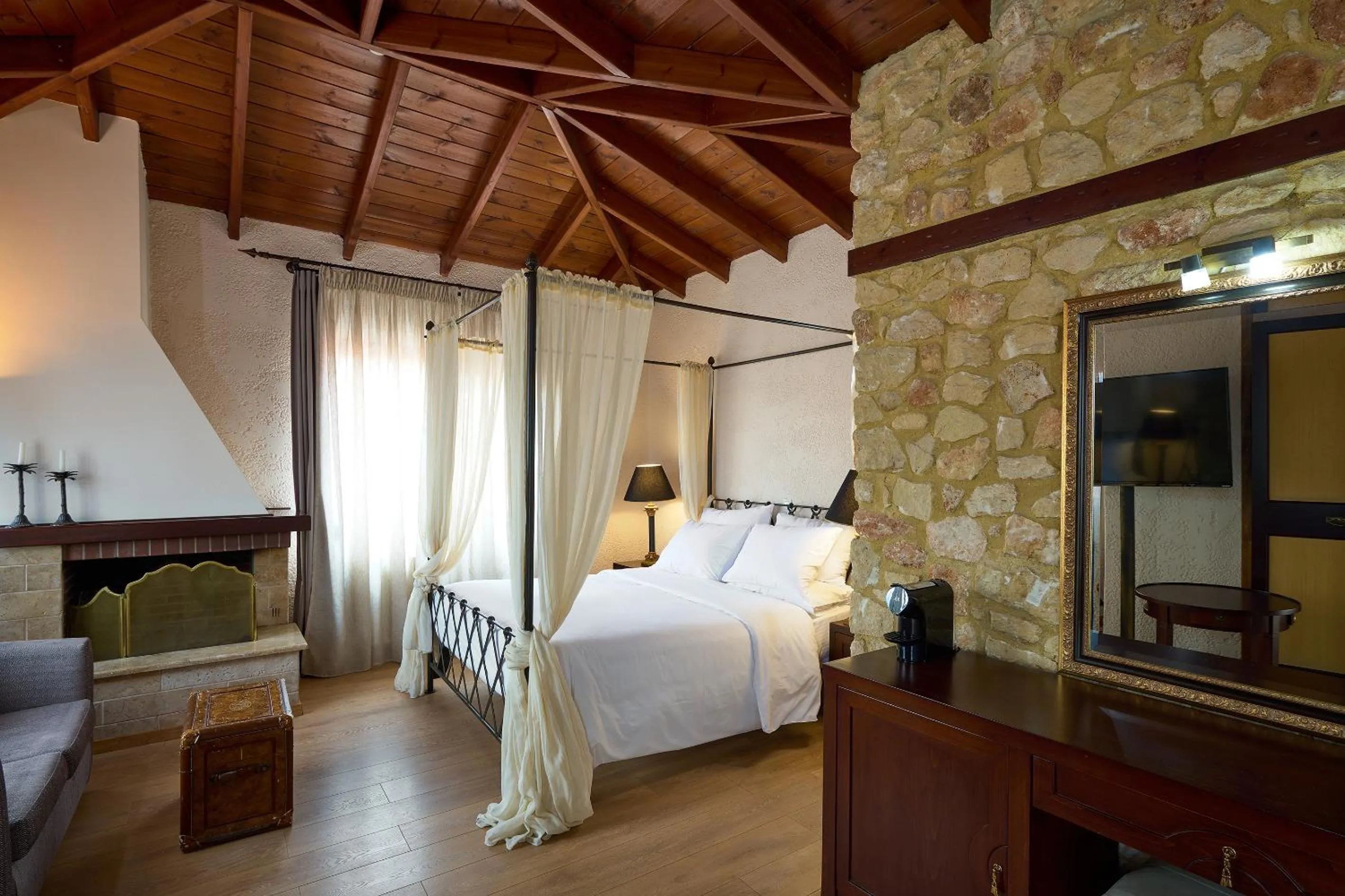 Bed in Olympus Mediterranean Boutique Hotel