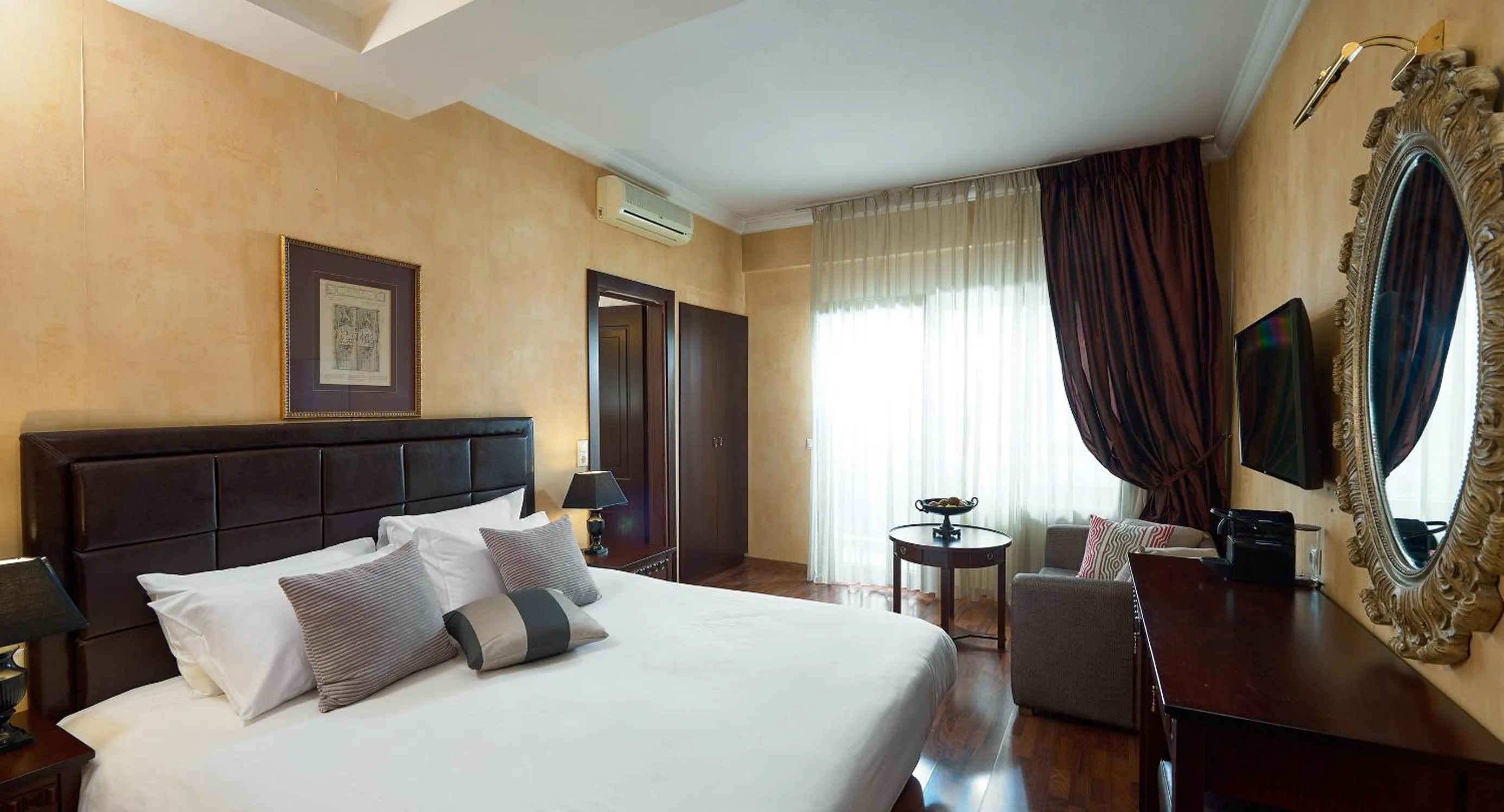 Bed in Olympus Mediterranean Boutique Hotel