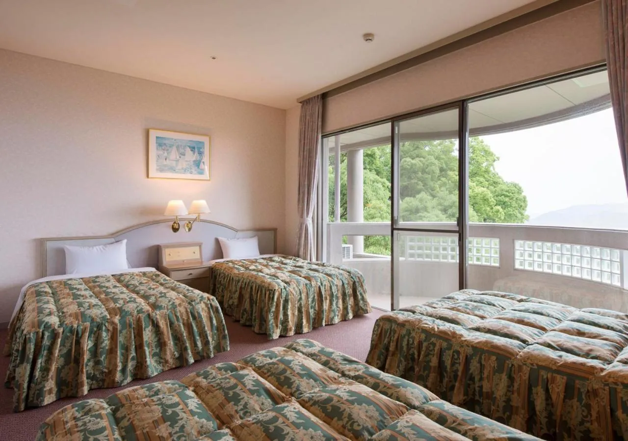 Bed in Izumigo Hotel Altia Toba