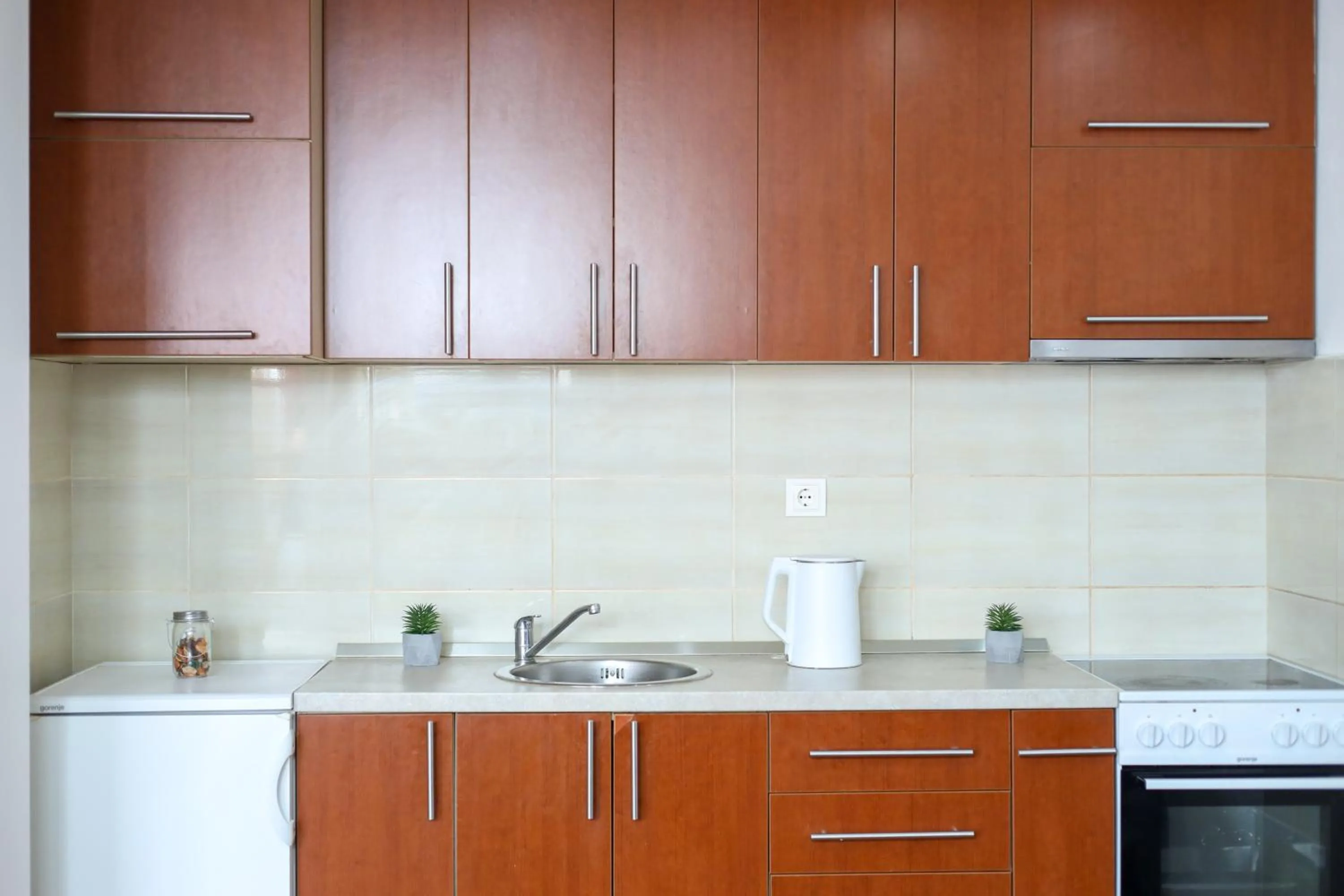 Kitchen or kitchenette in Airport Stay Apartments