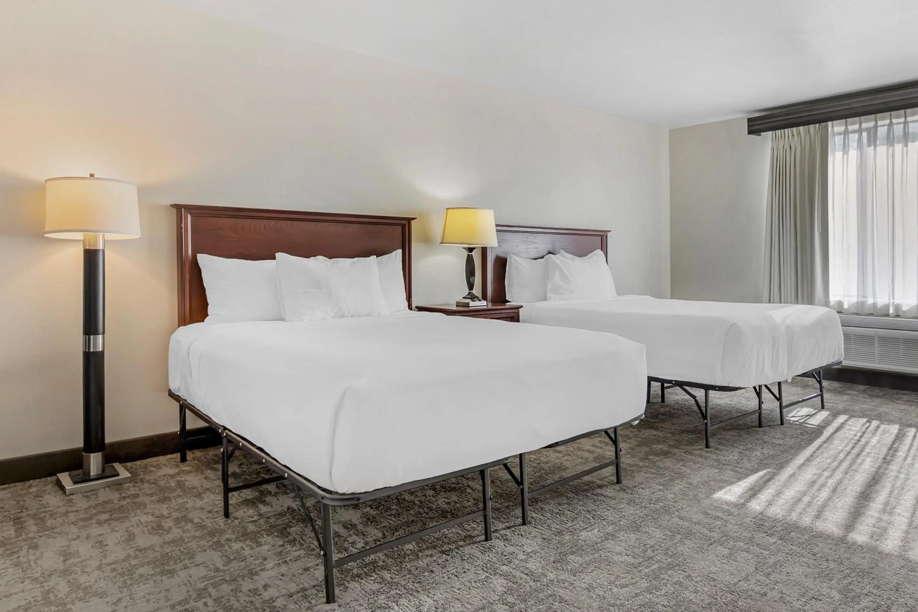 Bedroom in Seaport Inn & Suites