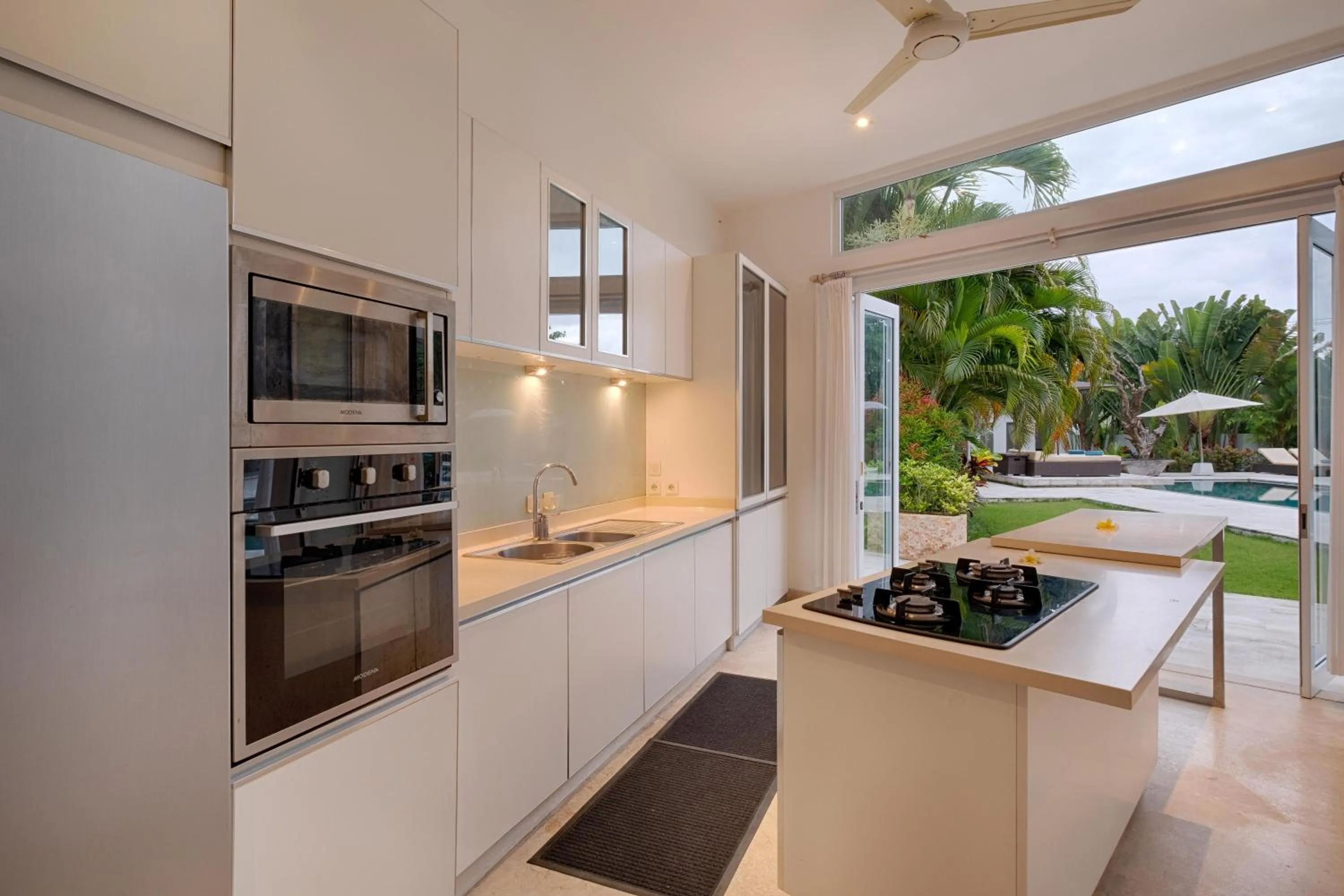 Communal kitchen in Canggu Villa by Sanga Sanga Hospitality