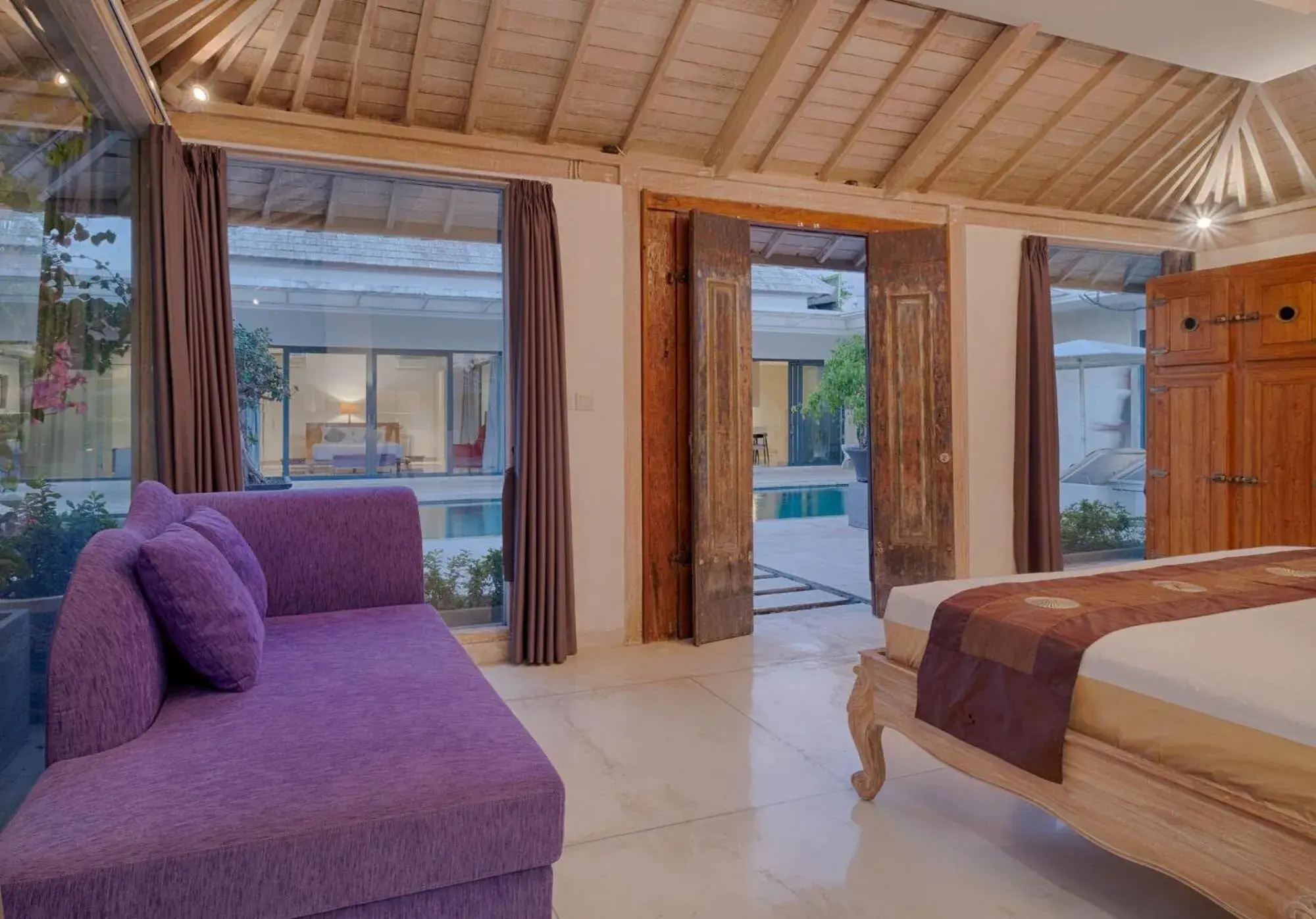 Pool view, Bed in Canggu Villa by Sanga Sanga Hospitality Pool view, Bed in Canggu Villa by Sanga Sanga Hospitality