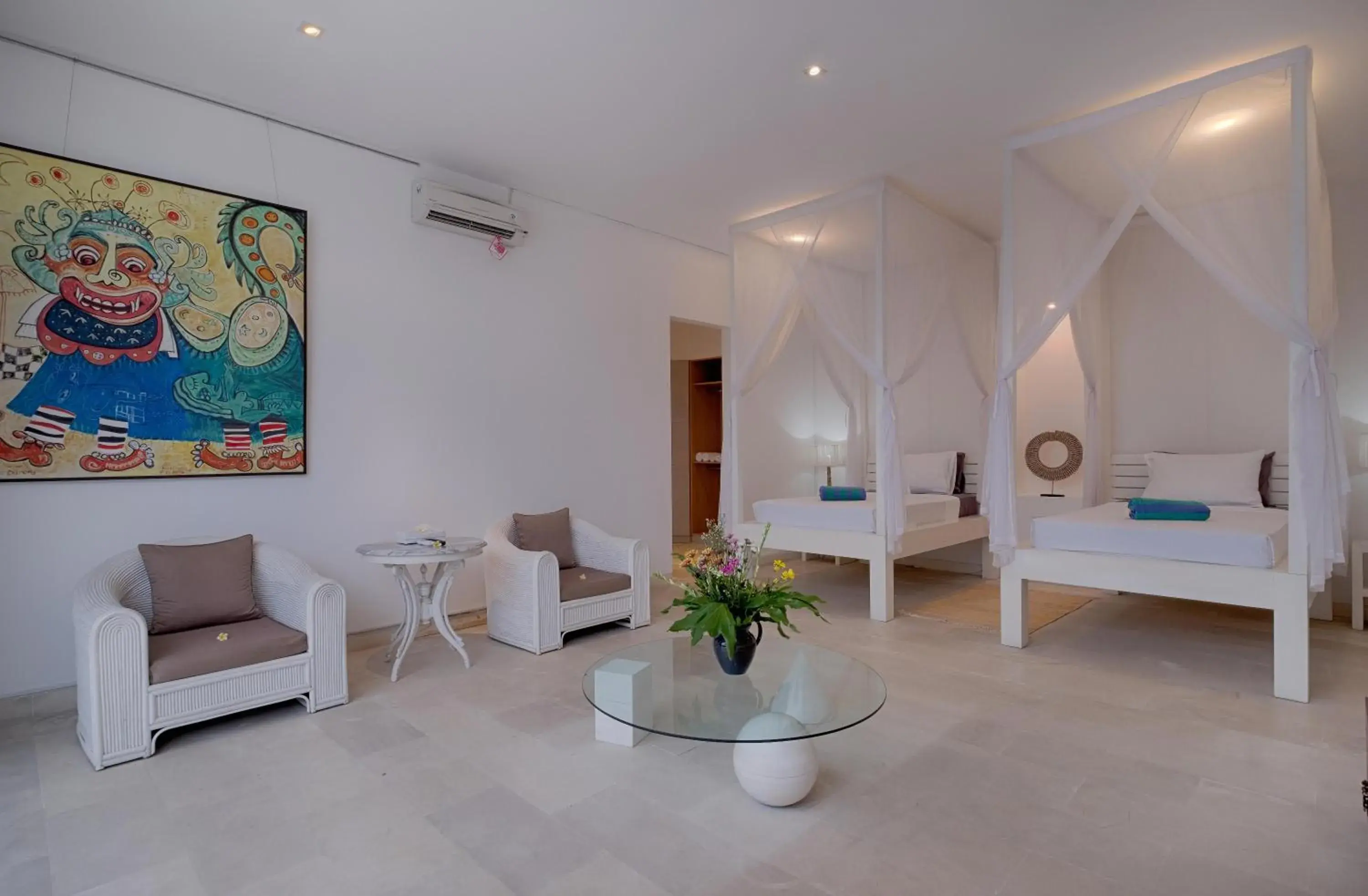 Seating area, Bed in Canggu Villa by Sanga Sanga Hospitality Seating area, Bed in Canggu Villa by Sanga Sanga Hospitality