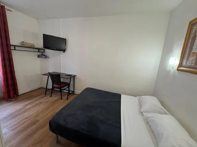 Bed in Hotel Chevallier