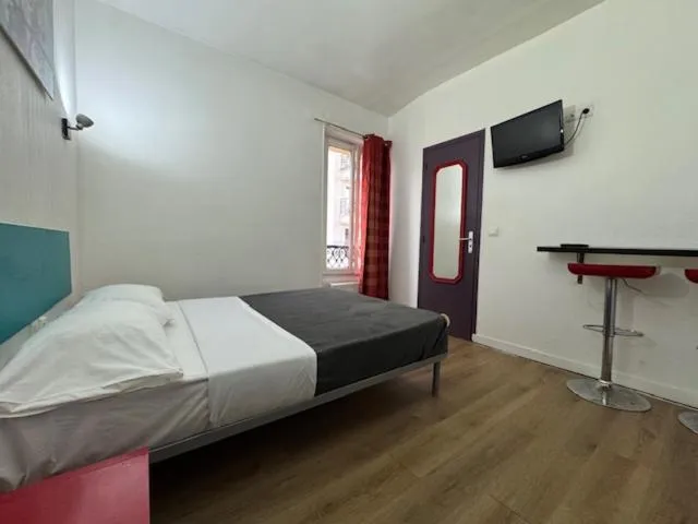 Bed in Hotel Chevallier