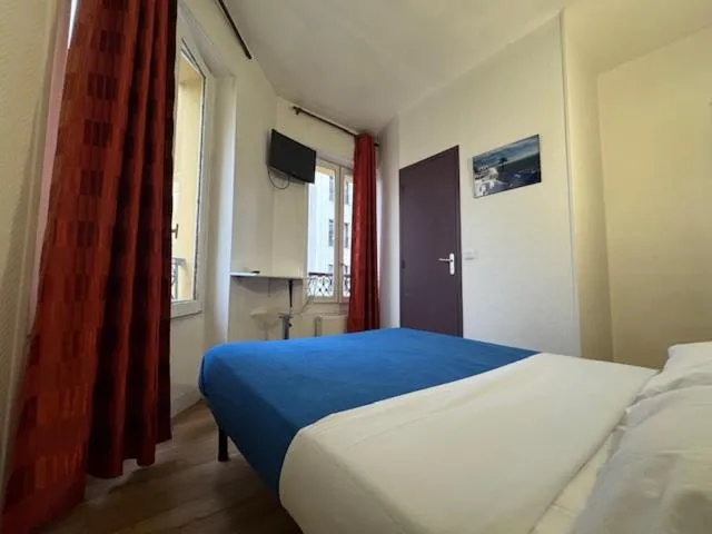 Bed in Hotel Chevallier