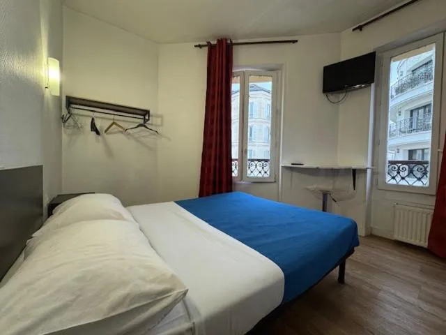 Bed in Hotel Chevallier