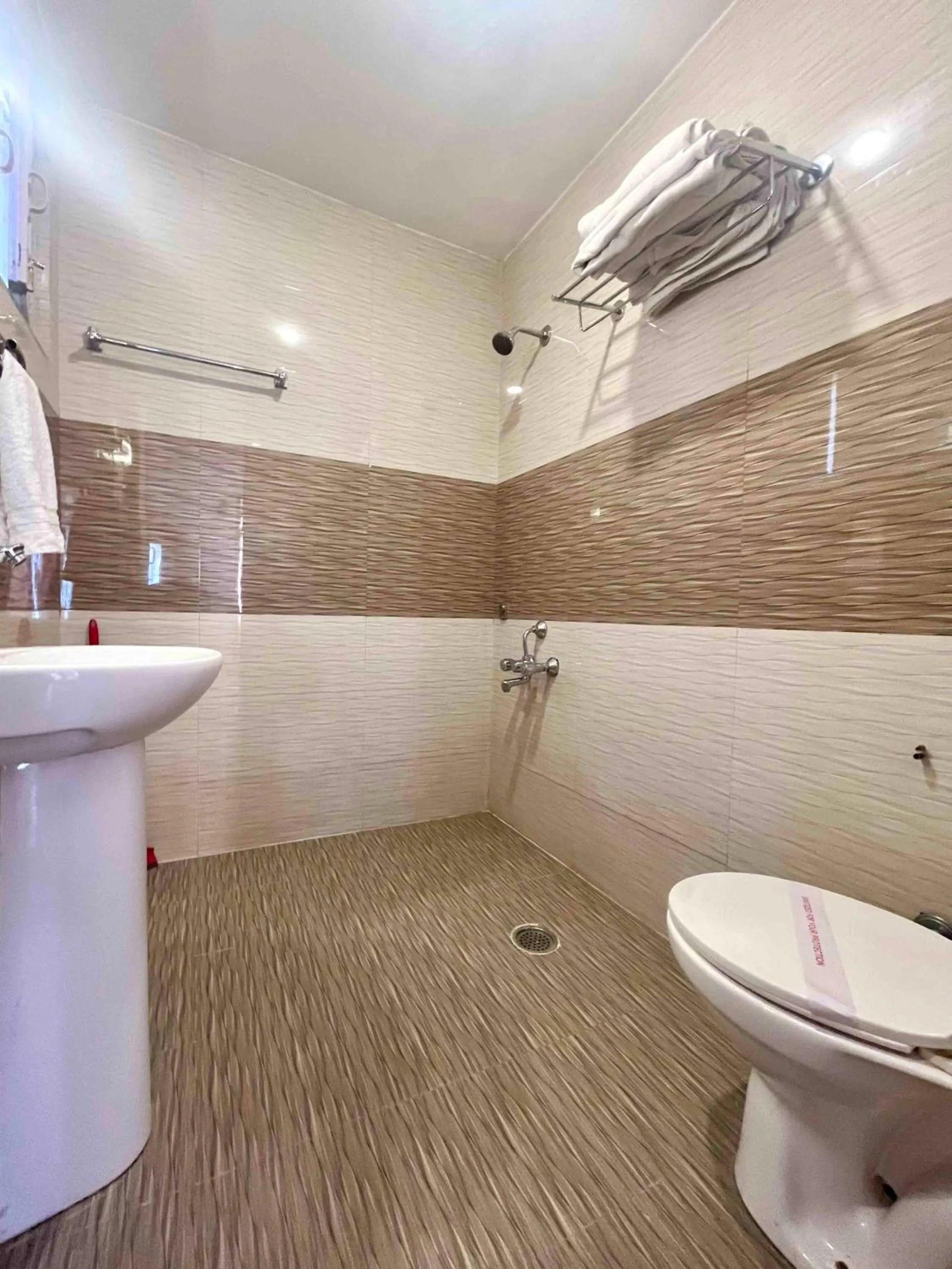 Bathroom in Tourist Hotel 10 minutes walking distance from the mall