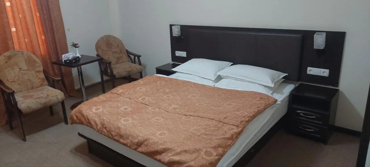 Bed in GRAND STAR HOTEL