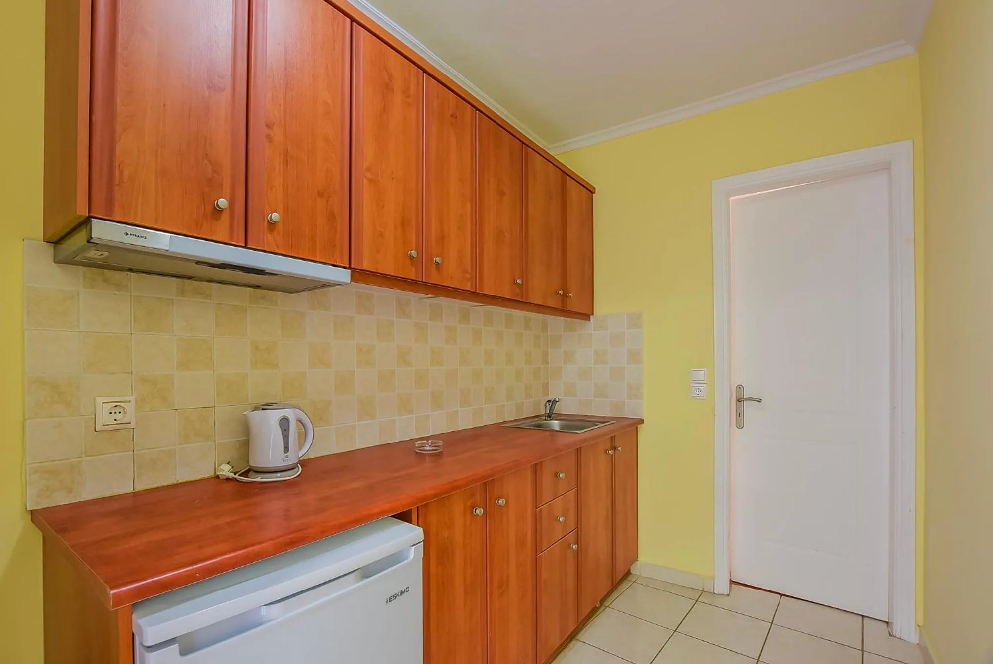 Kitchen or kitchenette in Timos Hotel