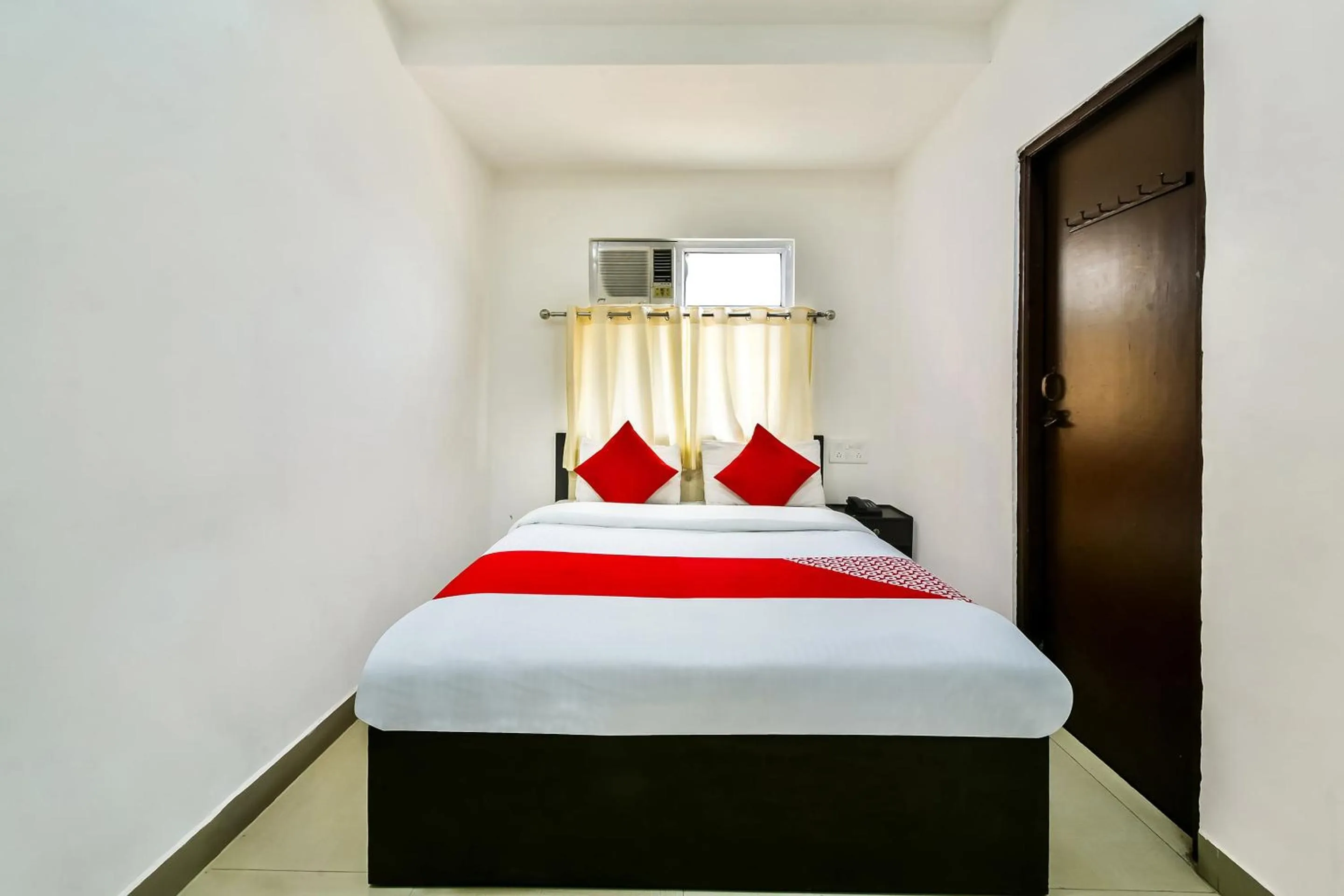 Bedroom in Hotel O Tirupati Residency Kota Airport