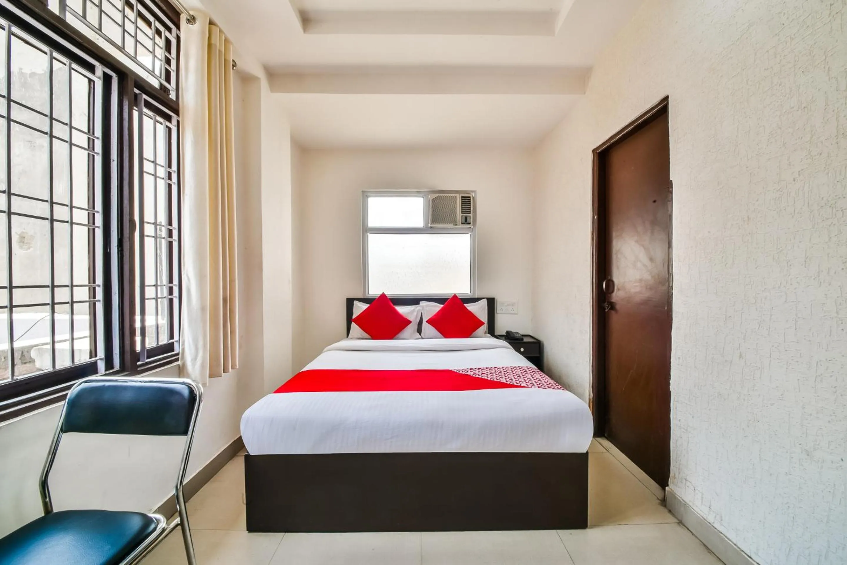 Bedroom in Hotel O Tirupati Residency Kota Airport