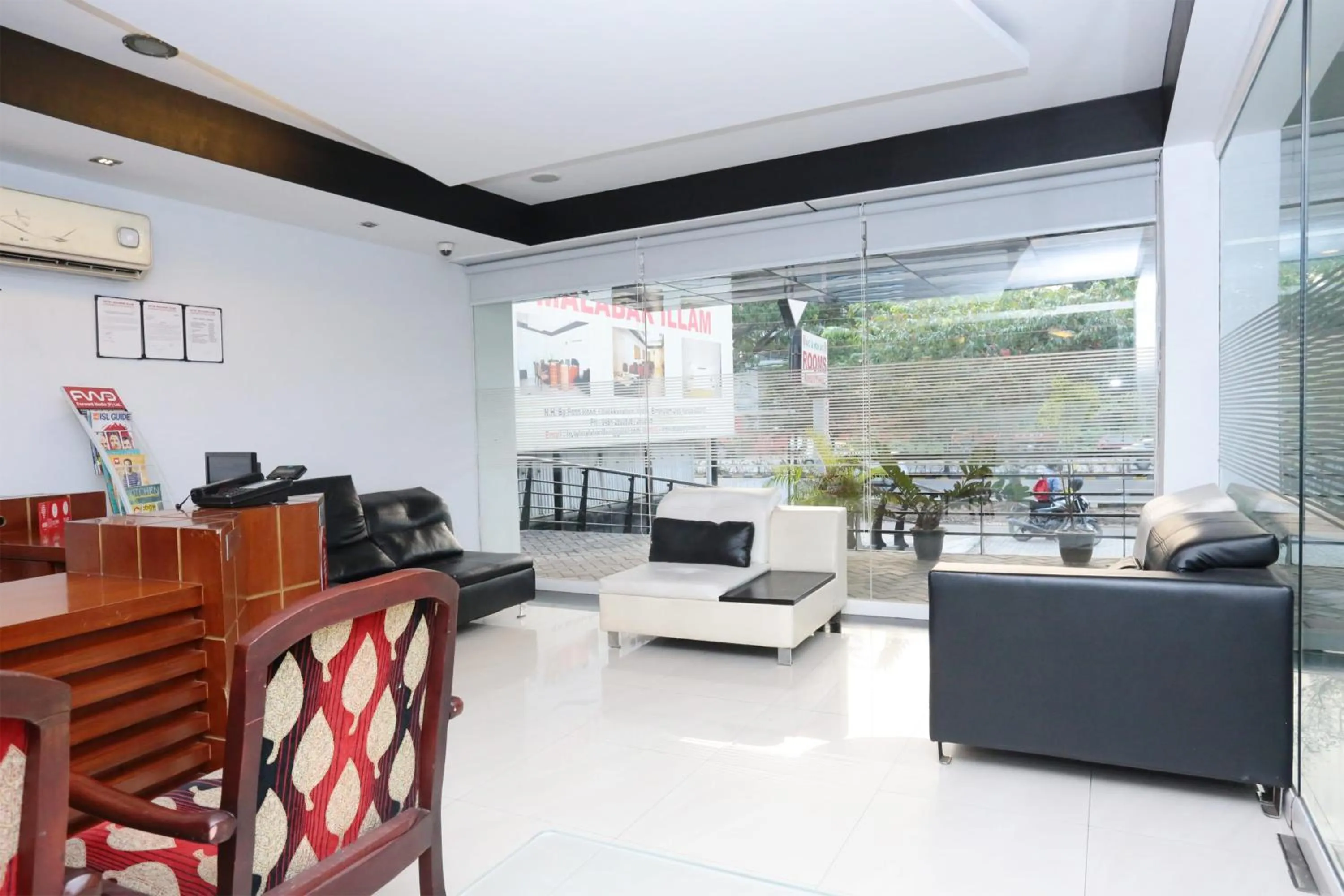 Lobby or reception in Super Townhouse Malabar Illam