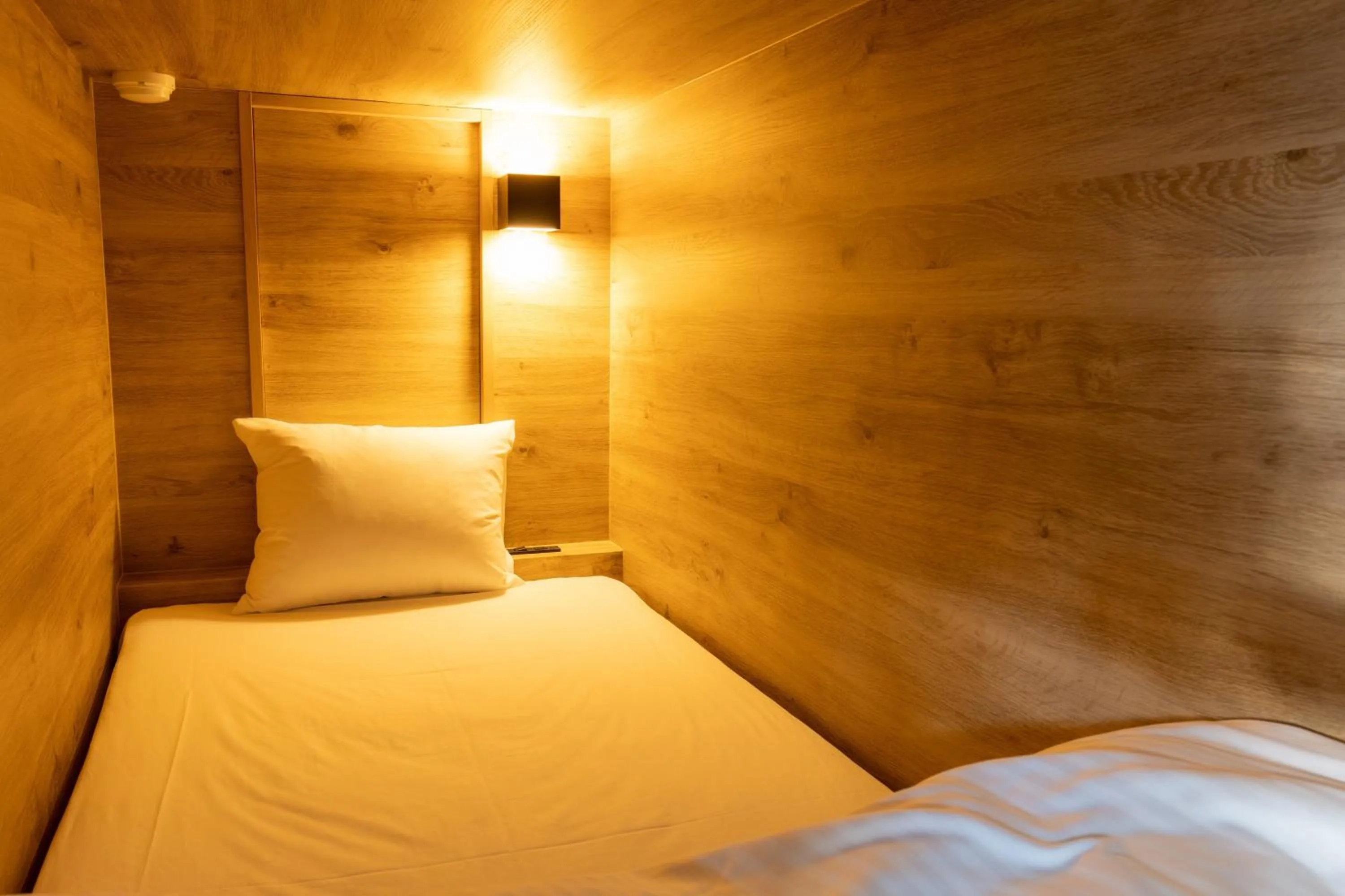 Bed in Kona Stay Bicycle Resort