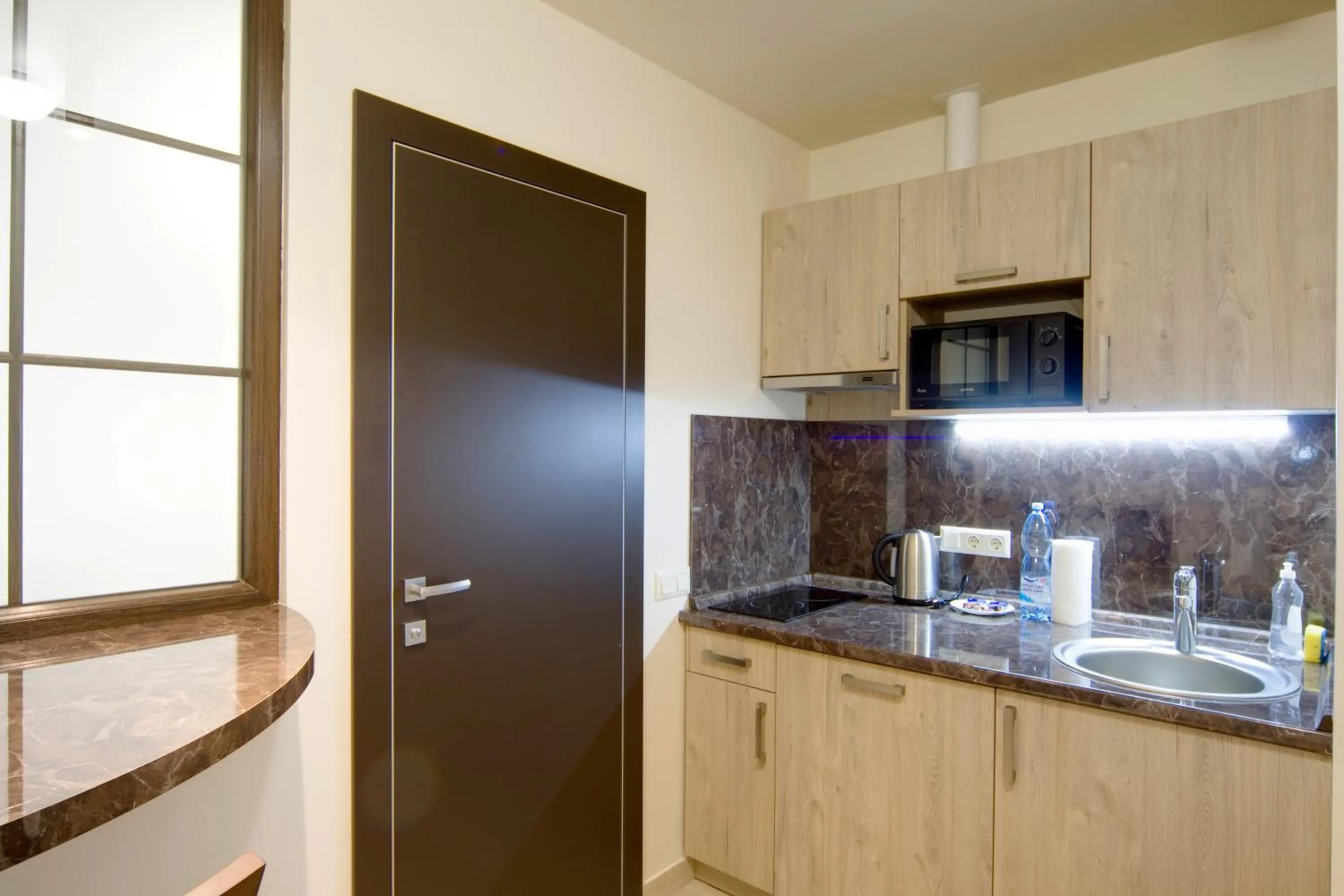 Kitchen or kitchenette in Arena Summit Apart Hotel