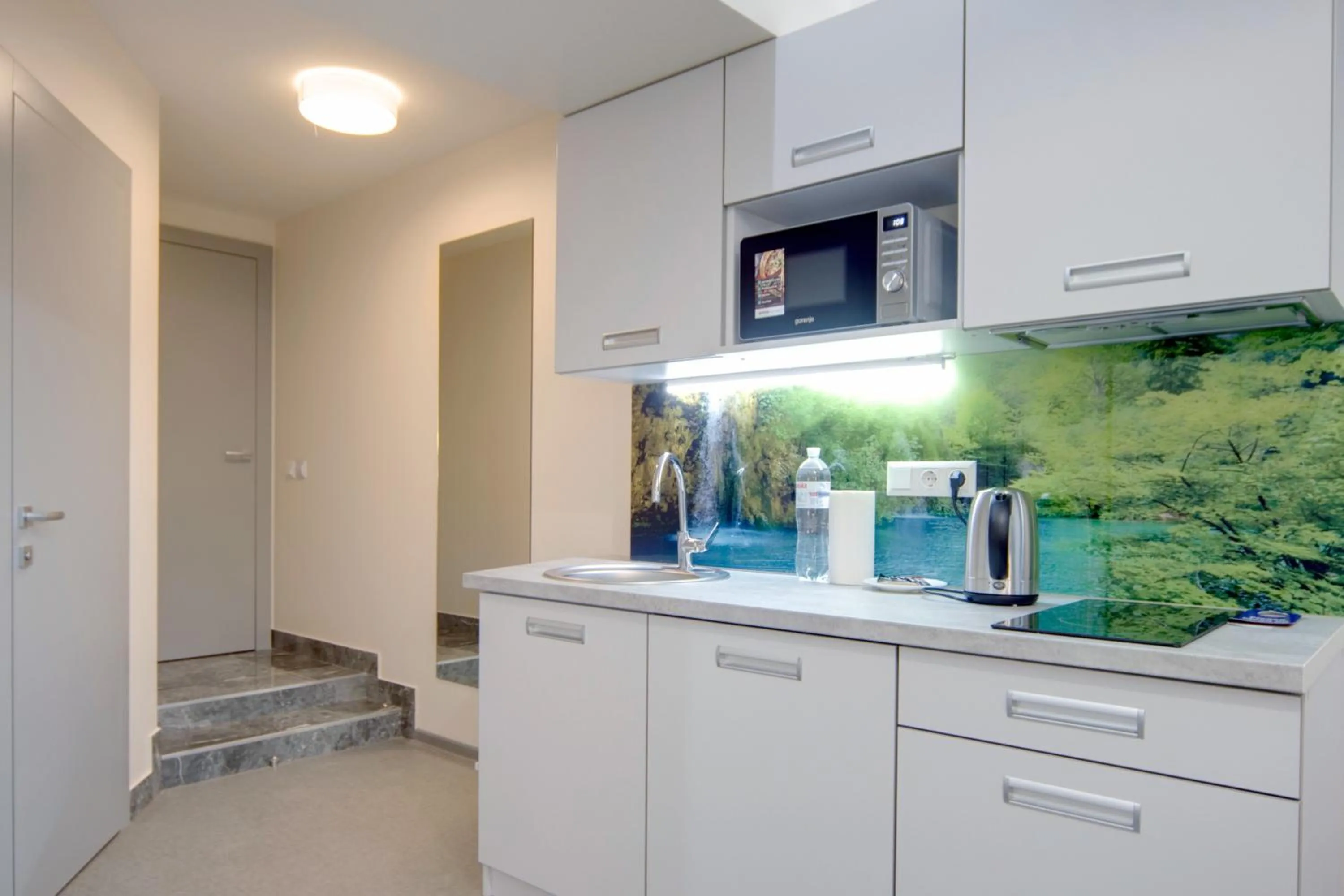 Kitchen or kitchenette in Arena Summit Apart Hotel