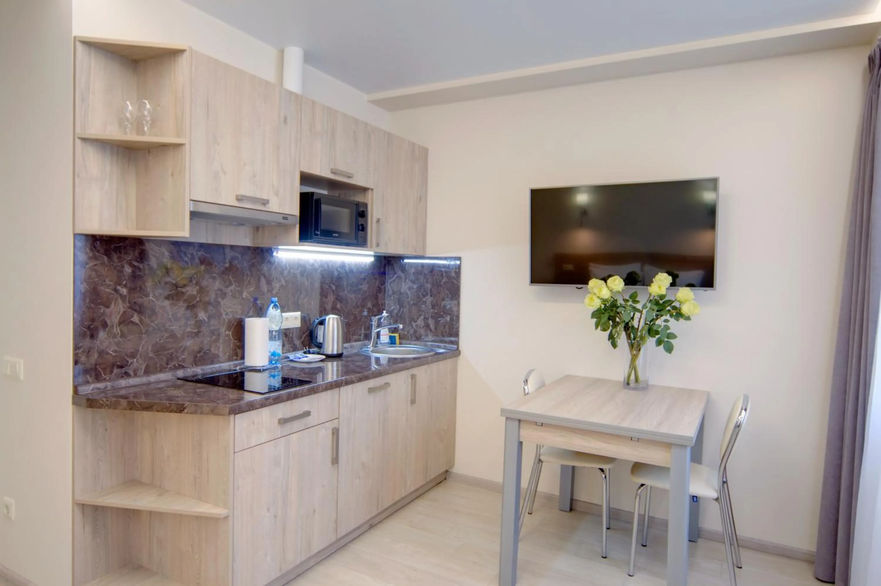 Kitchen or kitchenette in Arena Summit Apart Hotel
