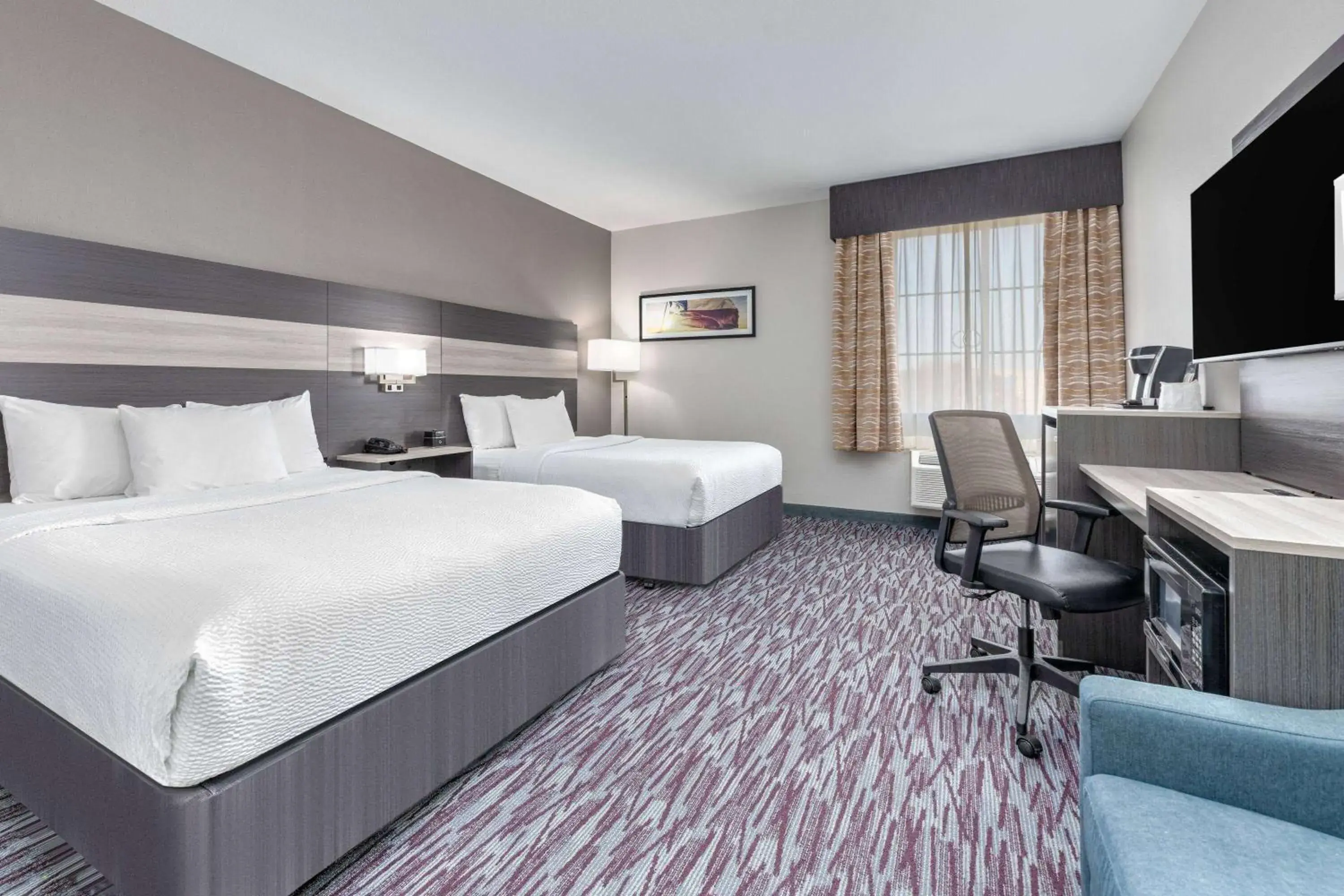 Queen Room with Two Queen Beds and Bath Tub - Mobility/Hearing Accessible - Non-Smoking in La Quinta by Wyndham Allen at The Village Queen Room with Two Queen Beds and Bath Tub - Mobility/Hearing Accessible - Non-Smoking in La Quinta by Wyndham Allen at The Village