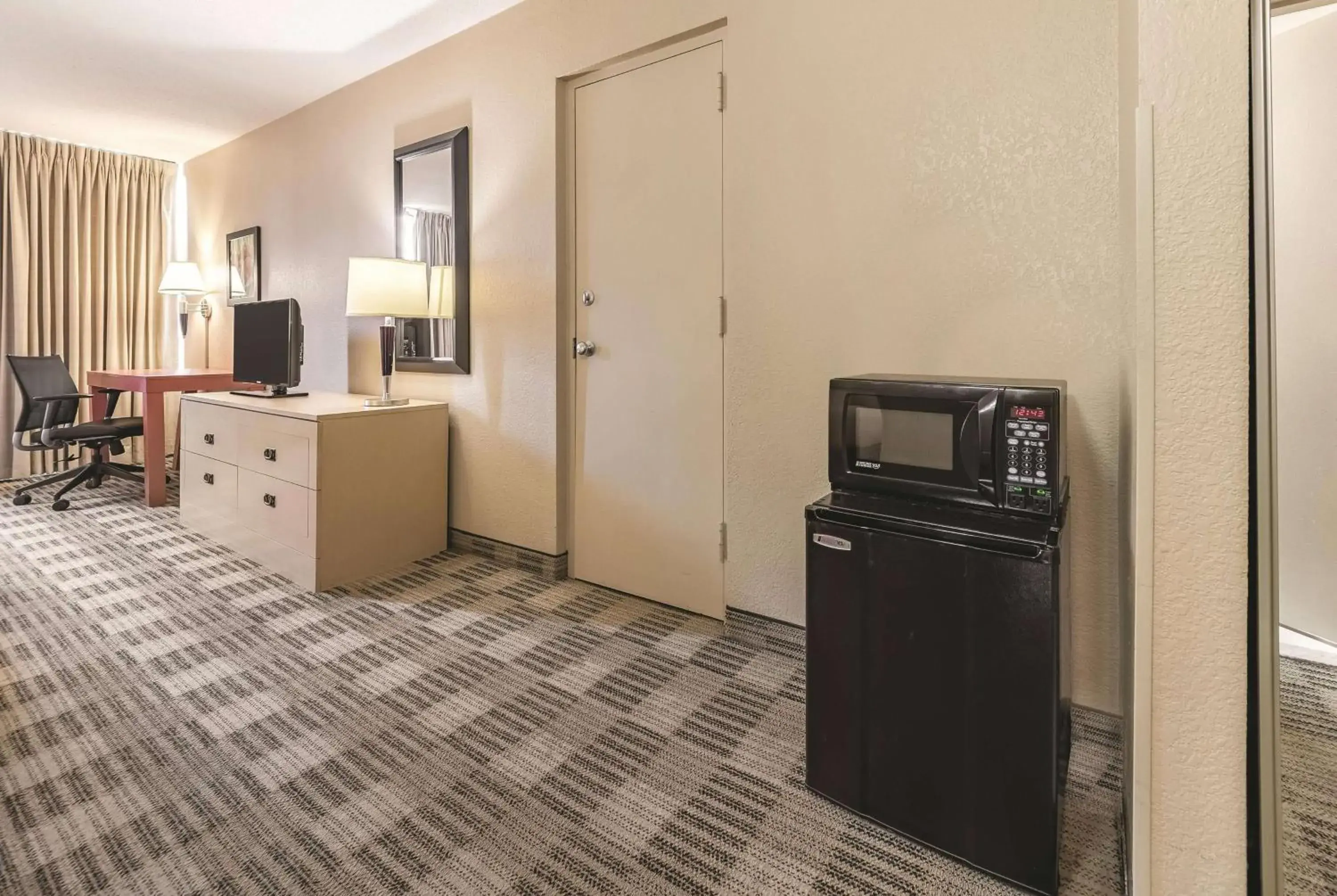 Photo of the whole room in Ramada Inn by Wyndham Fairfield NJ Photo of the whole room in Ramada Inn by Wyndham Fairfield NJ