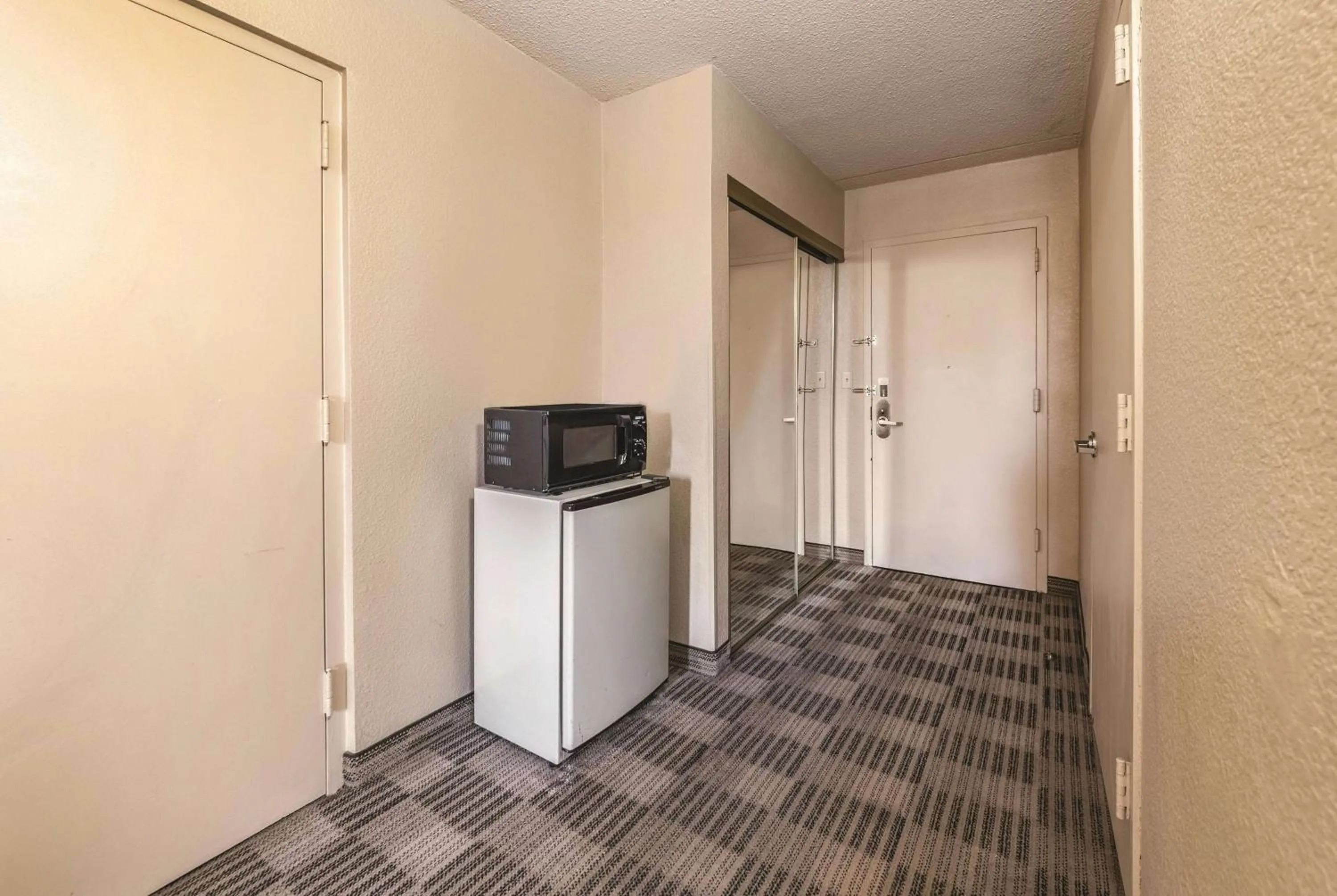 Photo of the whole room in Ramada Inn by Wyndham Fairfield NJ