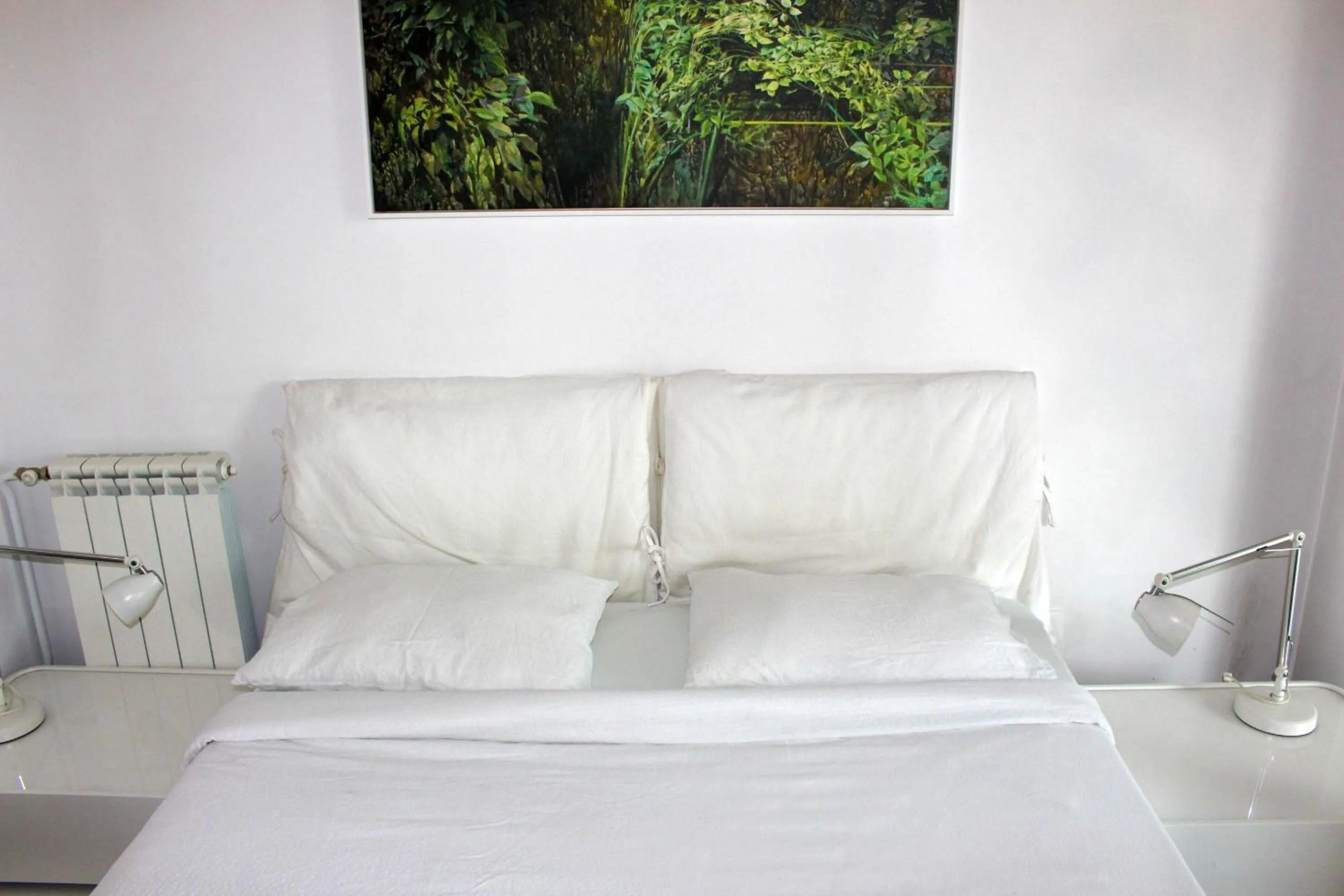 Bed in STATUS Superior Apartments