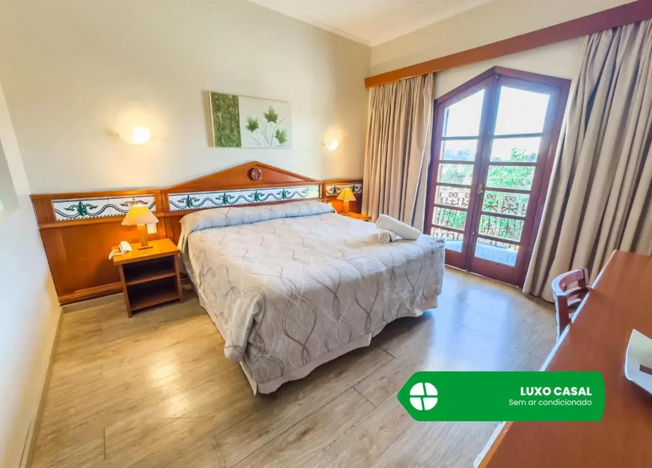 Bedroom, Bed in Hotel Nacional Inn Campos do Jordão Bedroom, Bed in Hotel Nacional Inn Campos do Jordão