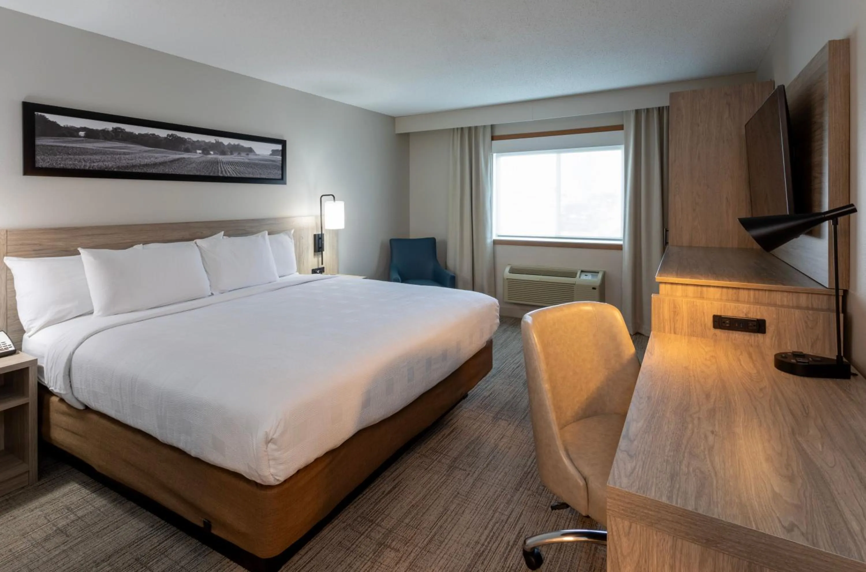 Bed in GrandStay Hotel & Suites