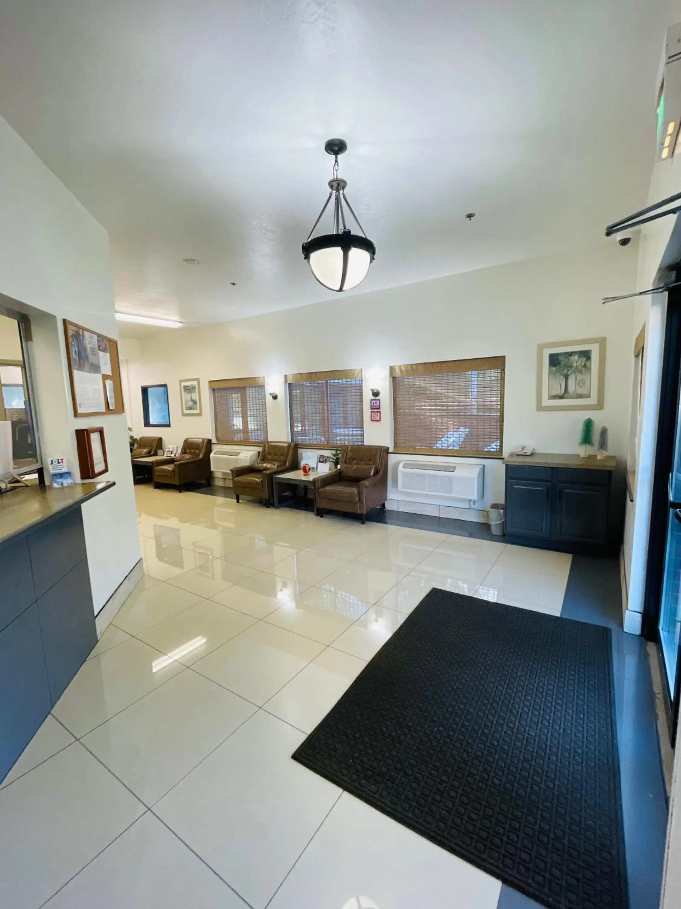 Seating area in Super 8 by Wyndham Lacey Olympia Area Seating area in Super 8 by Wyndham Lacey Olympia Area