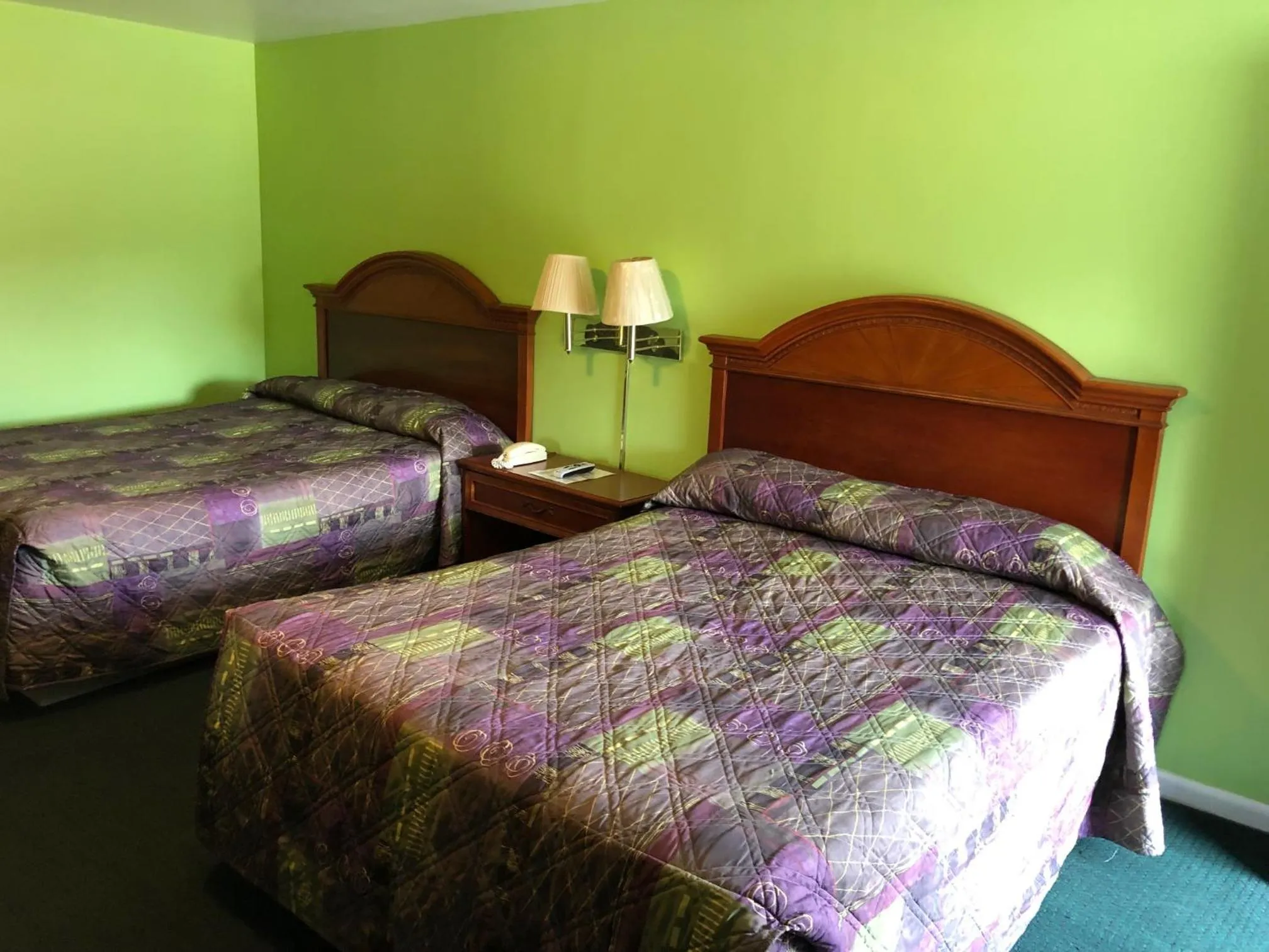 Bed in Ranch House Motel Marksville