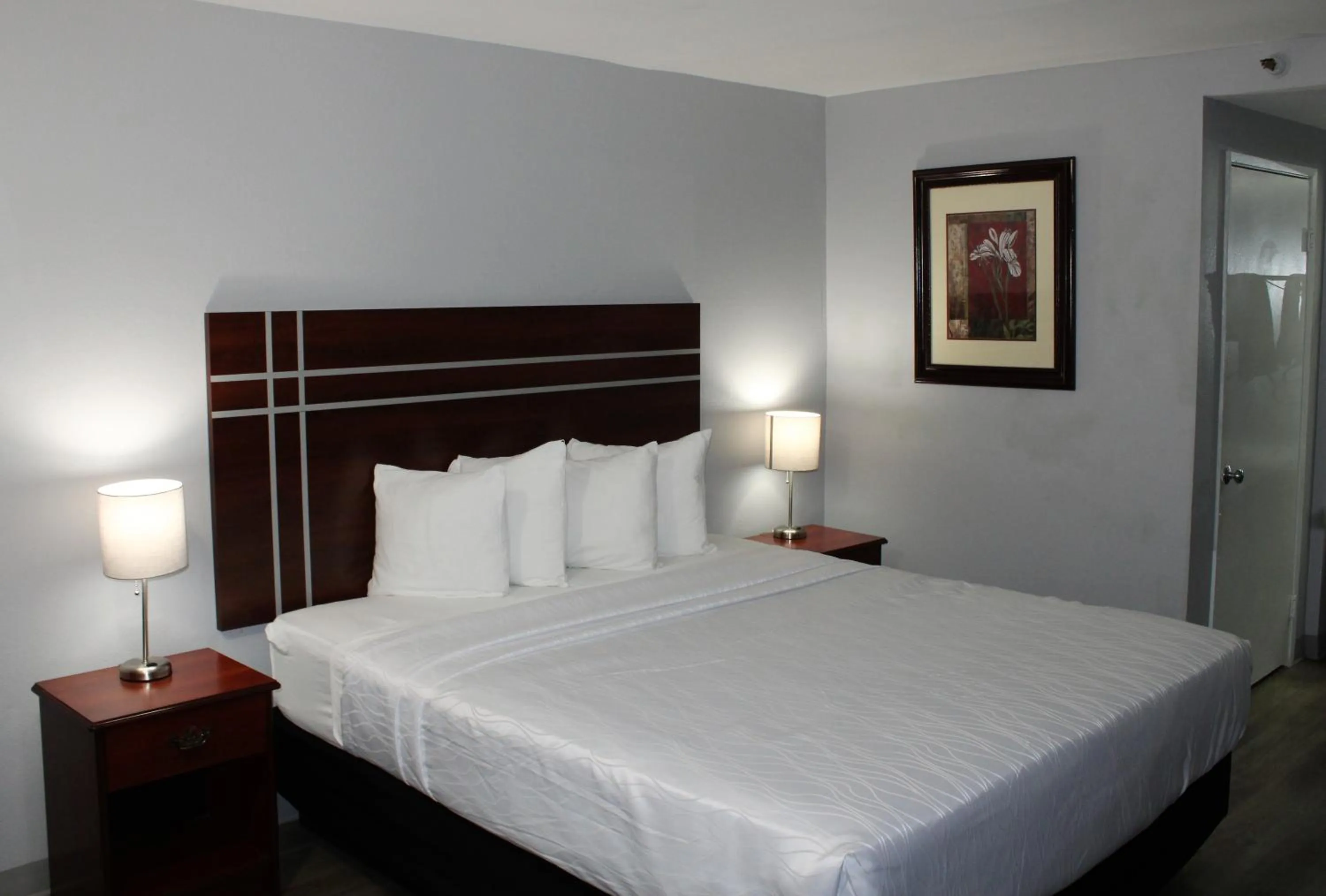 Bed in Rancho San Diego Inn & Suites