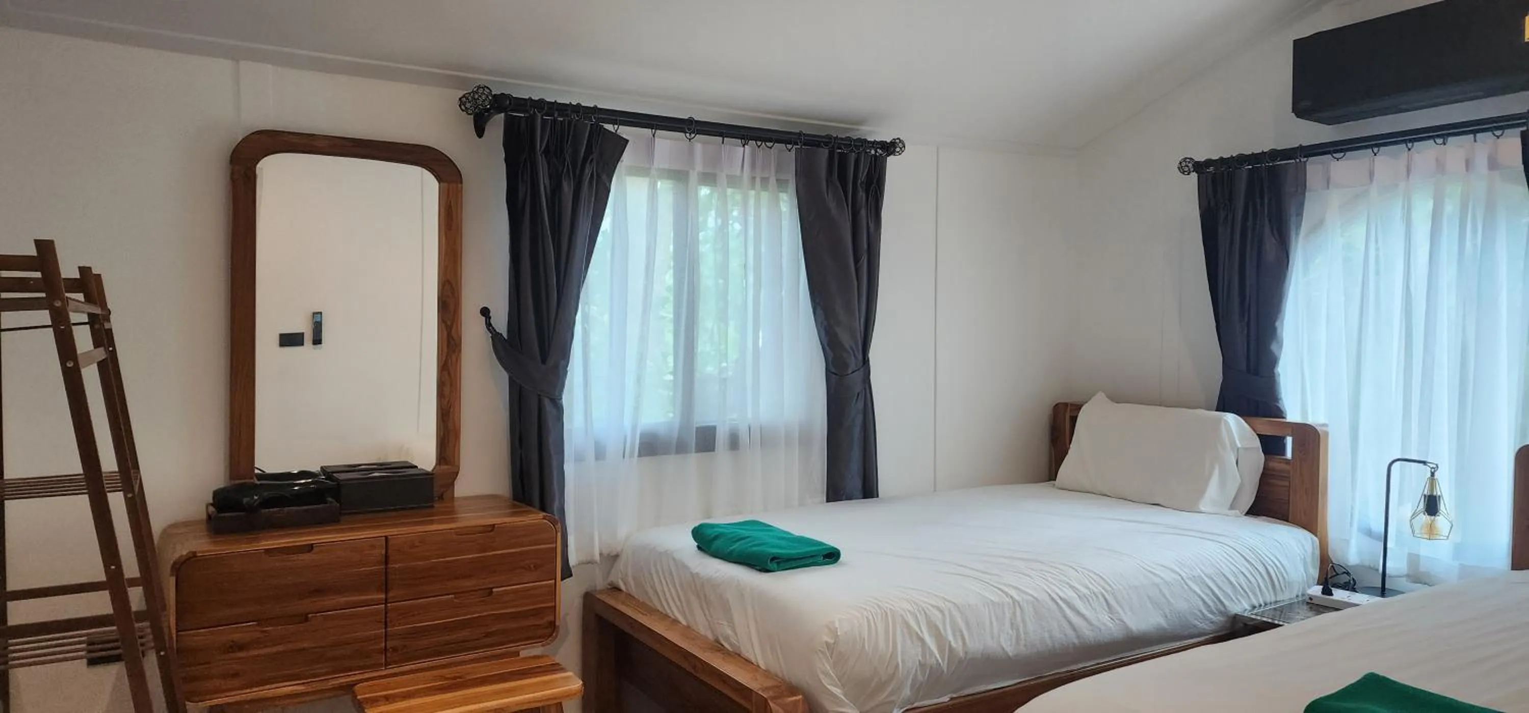 Bed in The Nidhra Boutique Resort