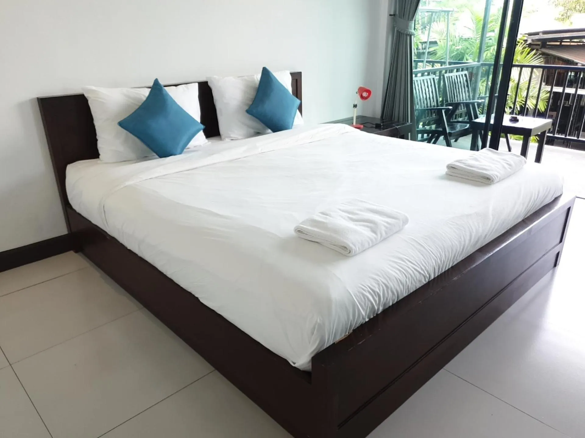 Bed in The Nidhra Boutique Resort