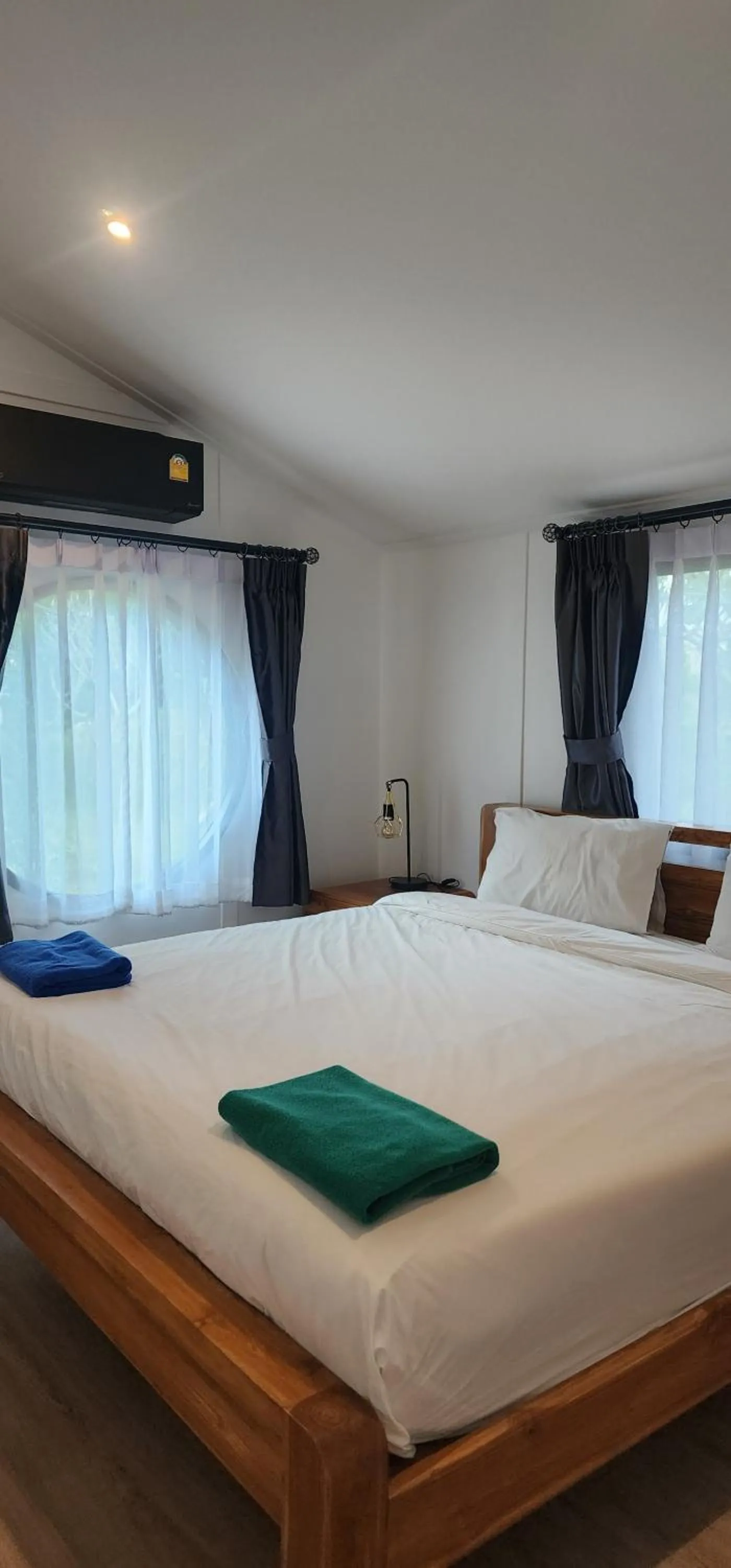 Bed in The Nidhra Boutique Resort