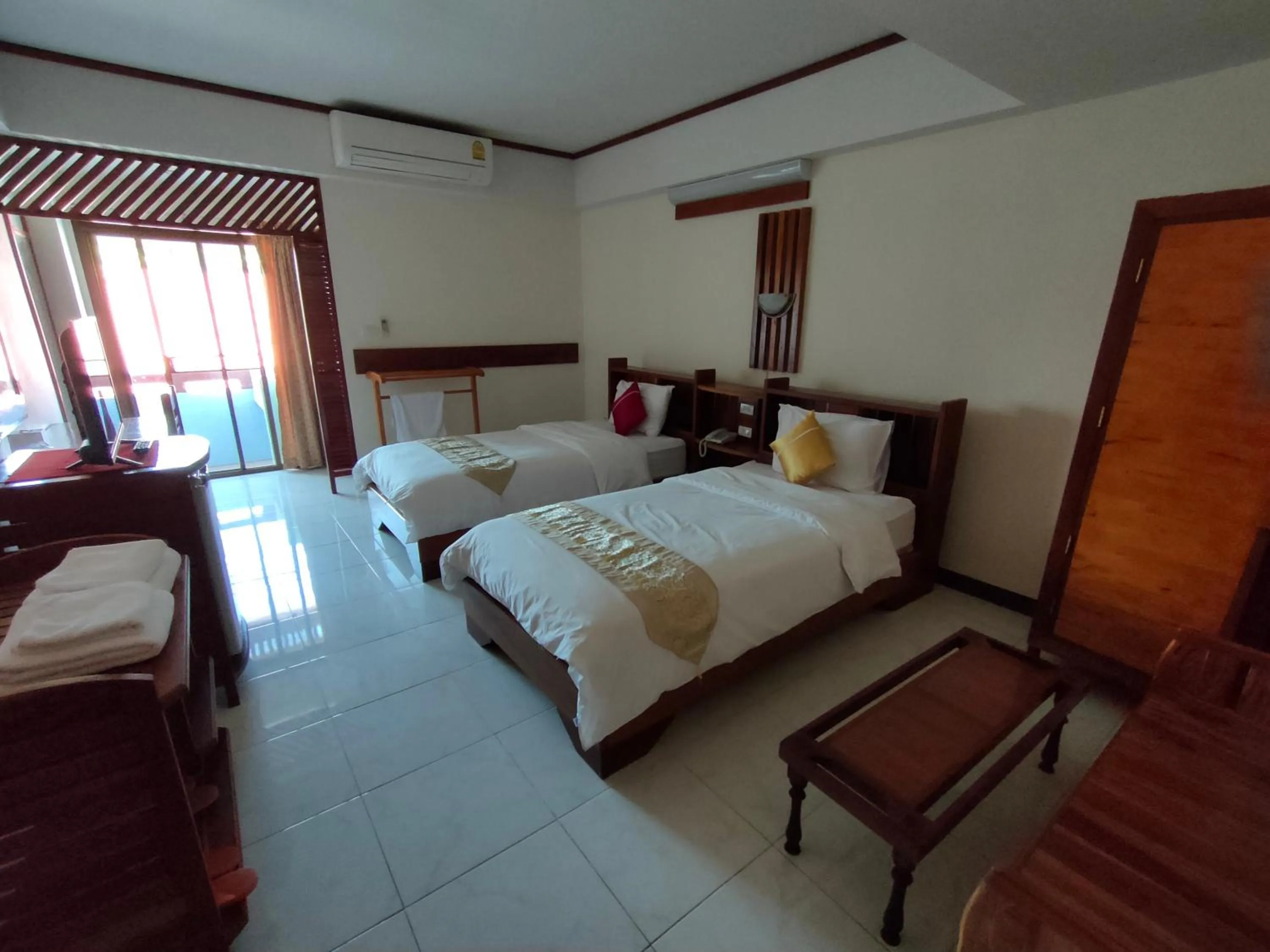 Bed in Riverfront Hotel Mukdahan