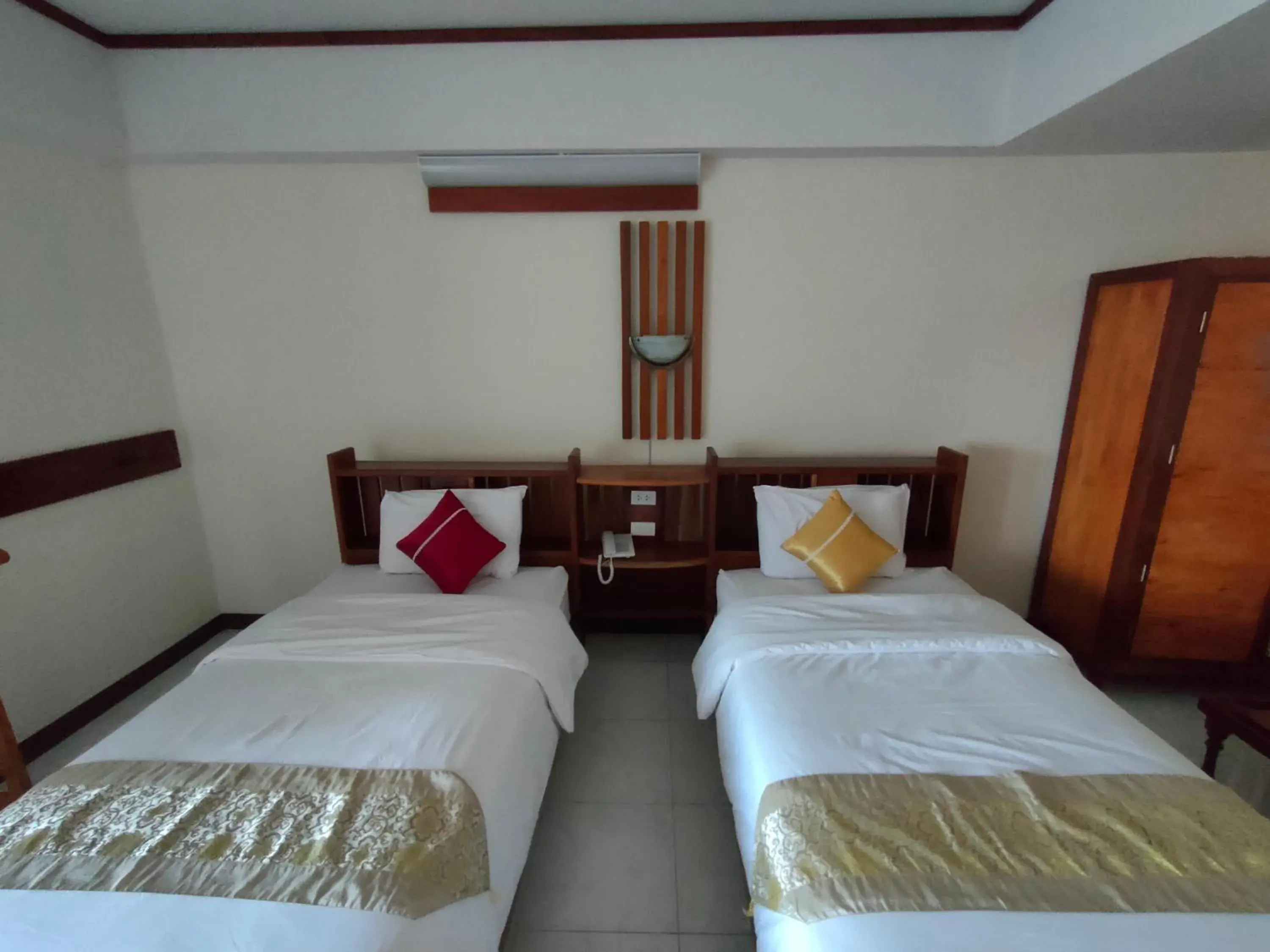 Bed in Riverfront Hotel Mukdahan Bed in Riverfront Hotel Mukdahan