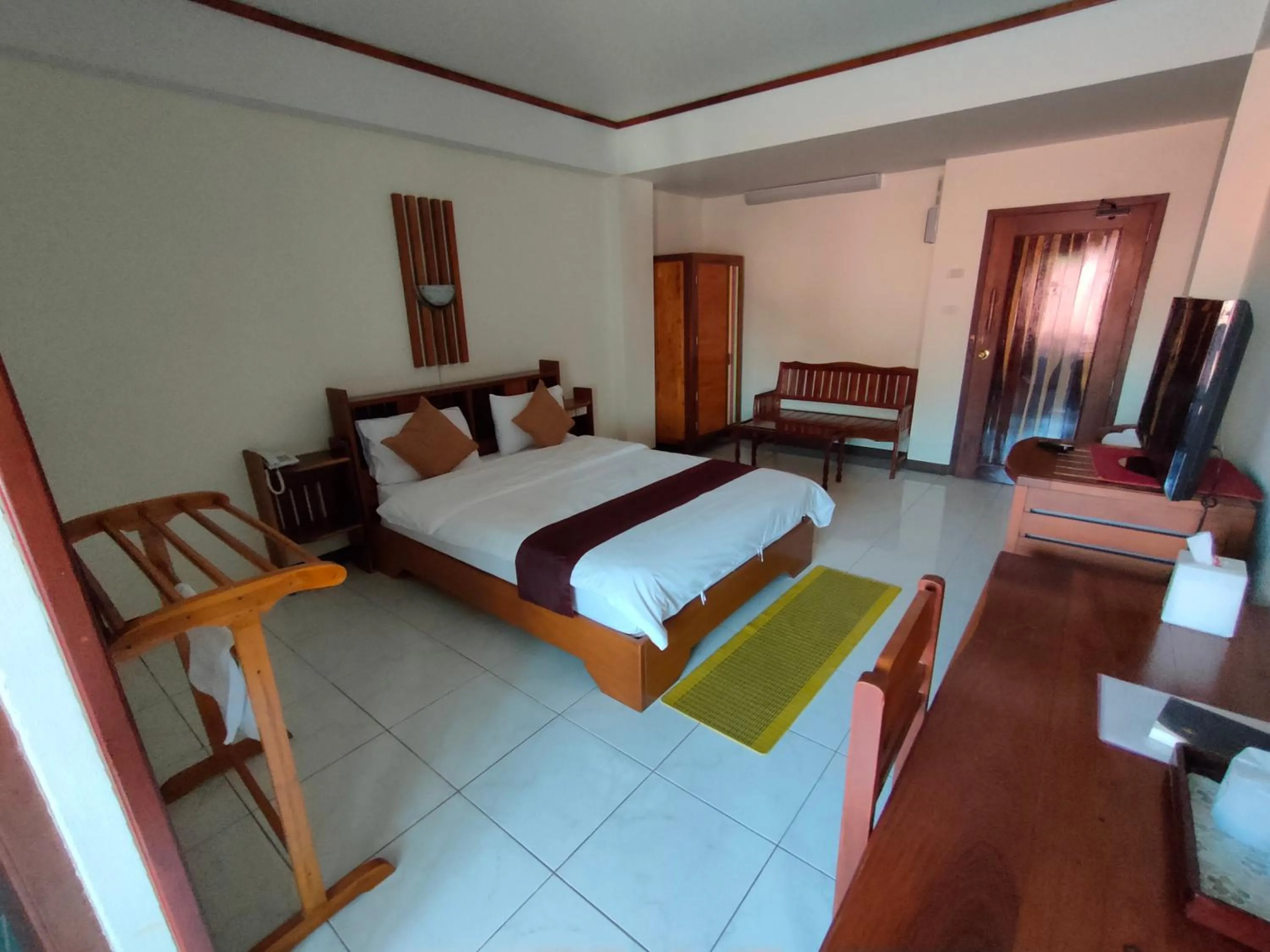 Bed in Riverfront Hotel Mukdahan