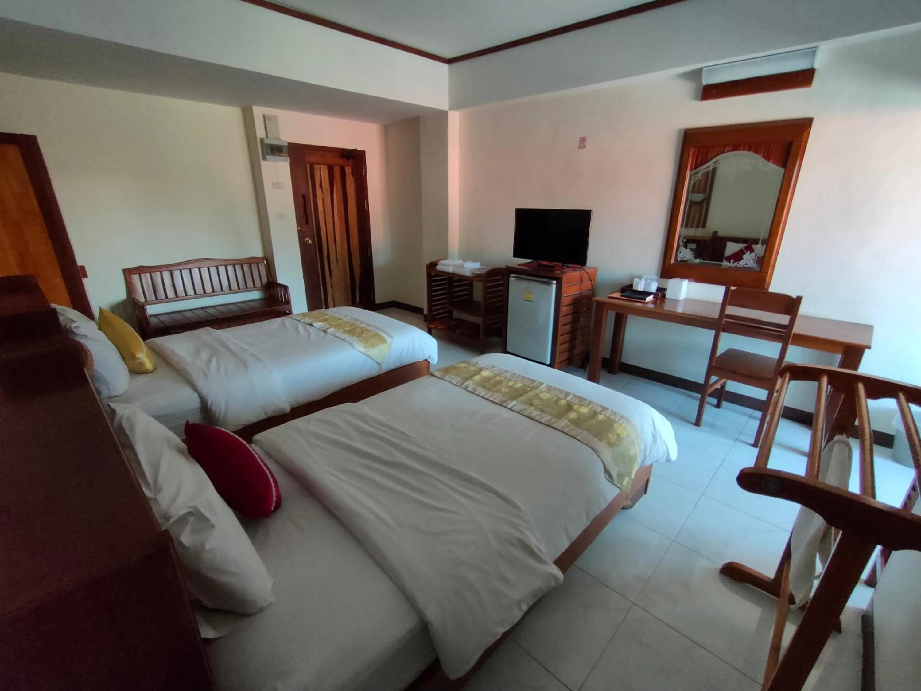 Bed in Riverfront Hotel Mukdahan