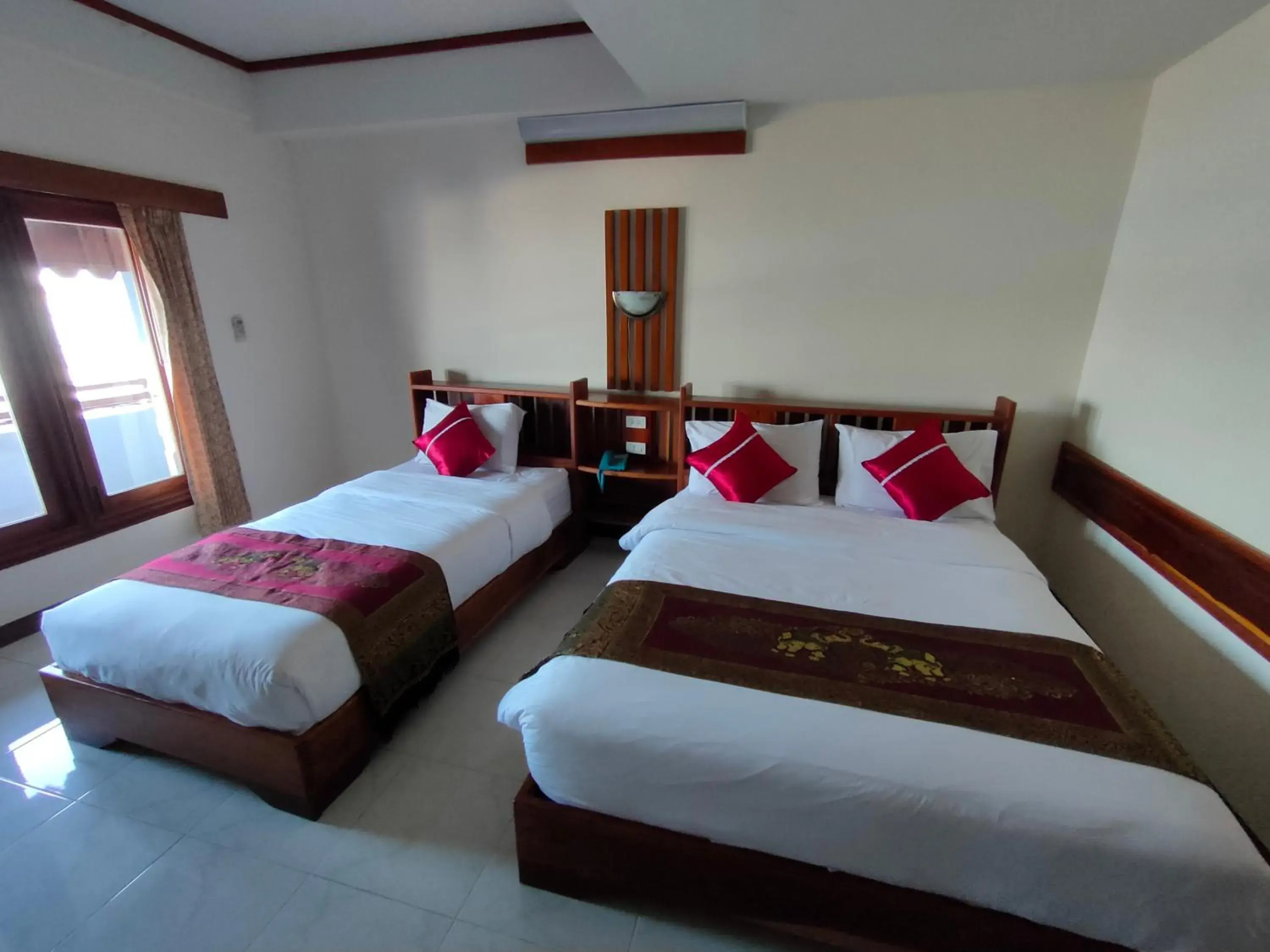 Bed in Riverfront Hotel Mukdahan Bed in Riverfront Hotel Mukdahan