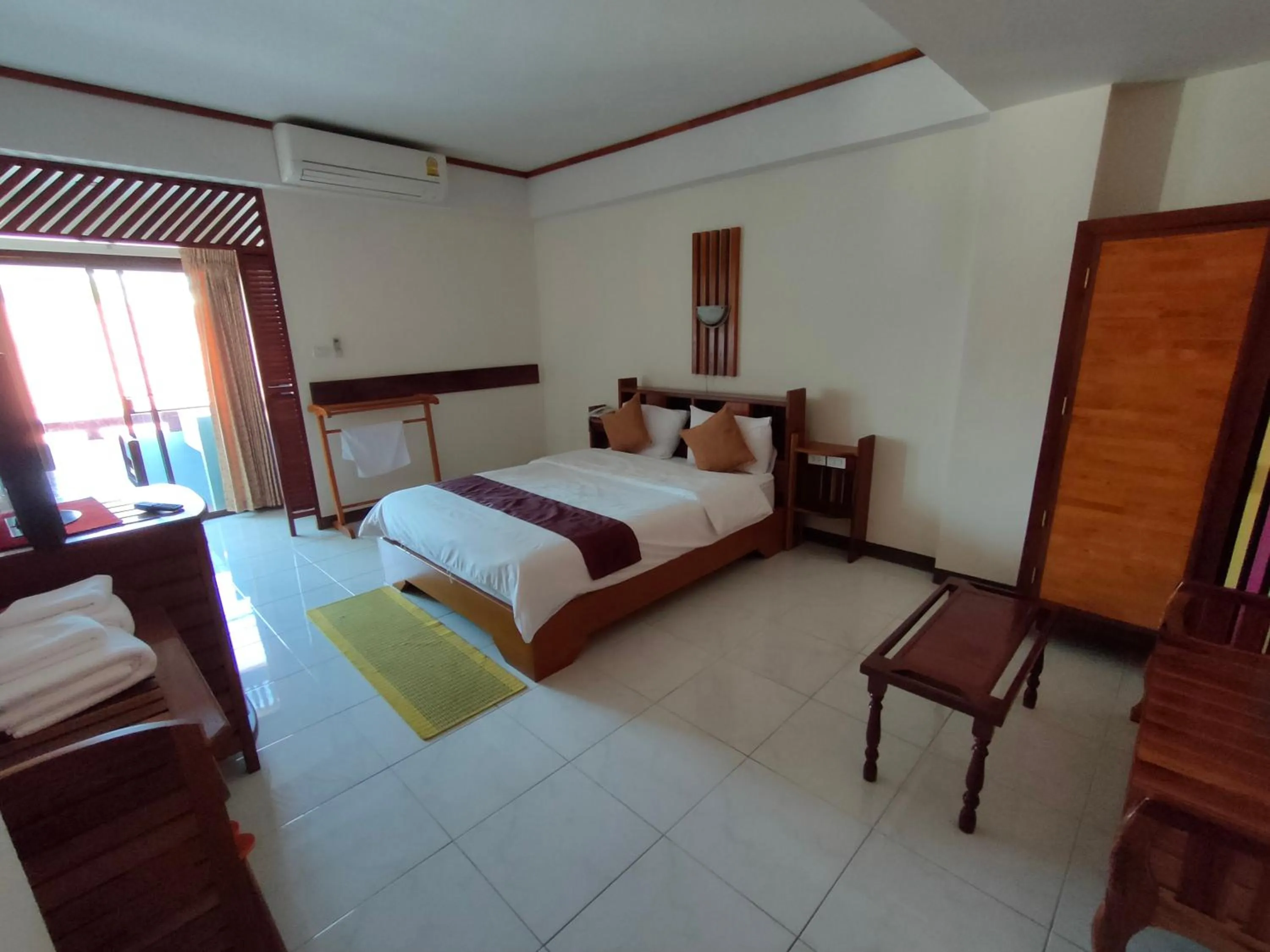 Bed in Riverfront Hotel Mukdahan