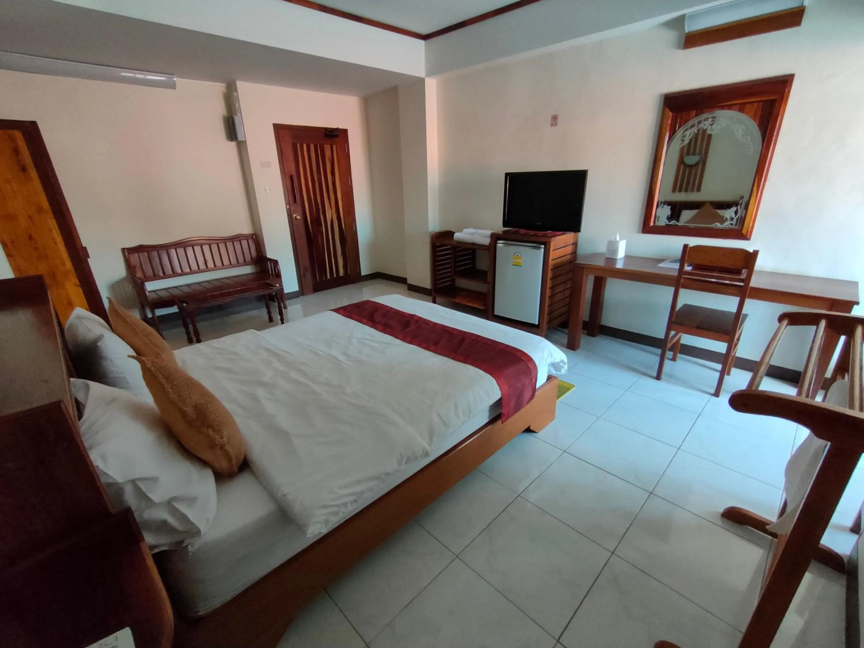 Bed in Riverfront Hotel Mukdahan