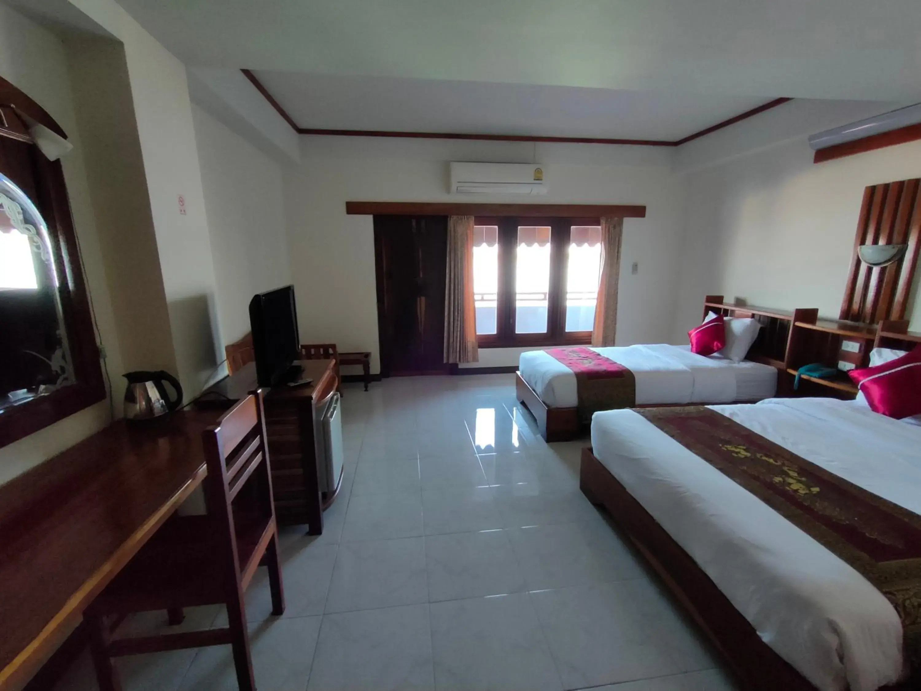 Bed in Riverfront Hotel Mukdahan Bed in Riverfront Hotel Mukdahan