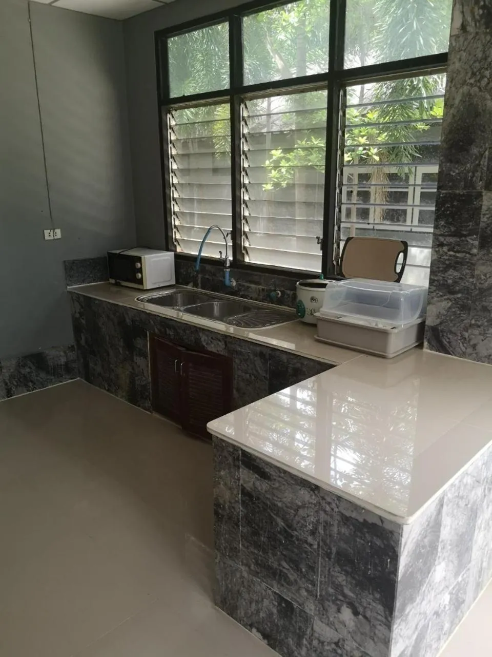 Kitchen or kitchenette in Buasawan Resort & Restaurant