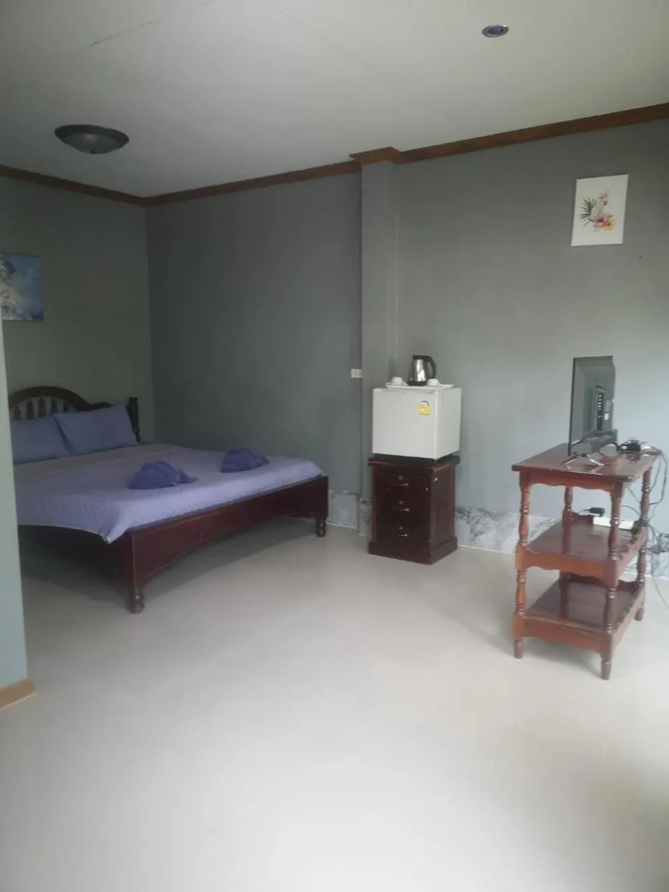 Bed in Buasawan Resort & Restaurant