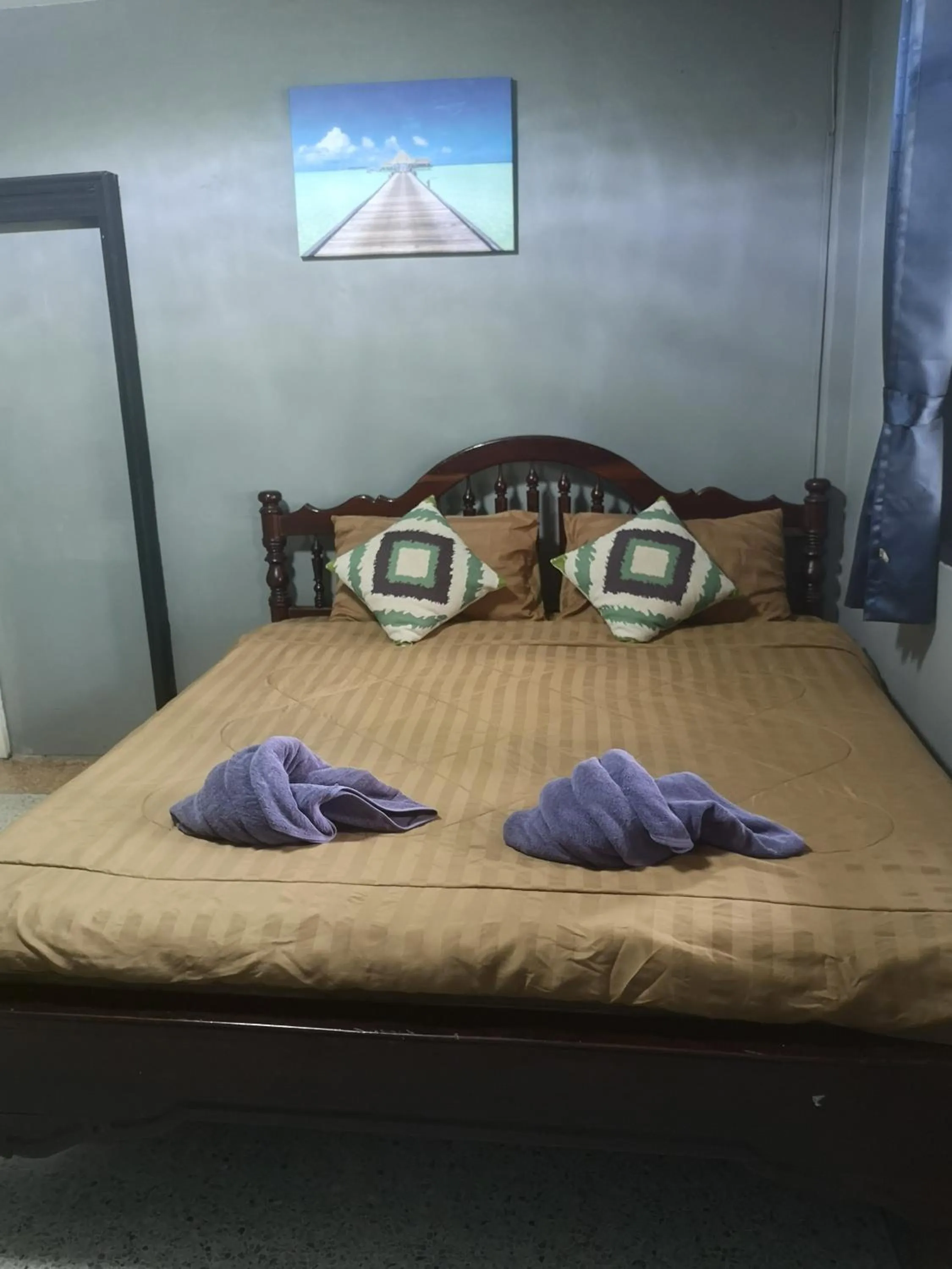 Bed in Buasawan Resort & Restaurant