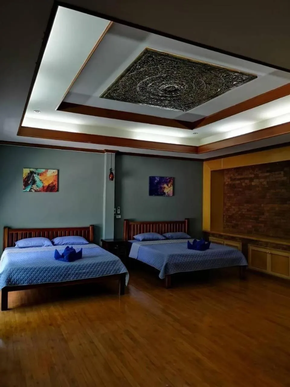 Bed in Buasawan Resort & Restaurant