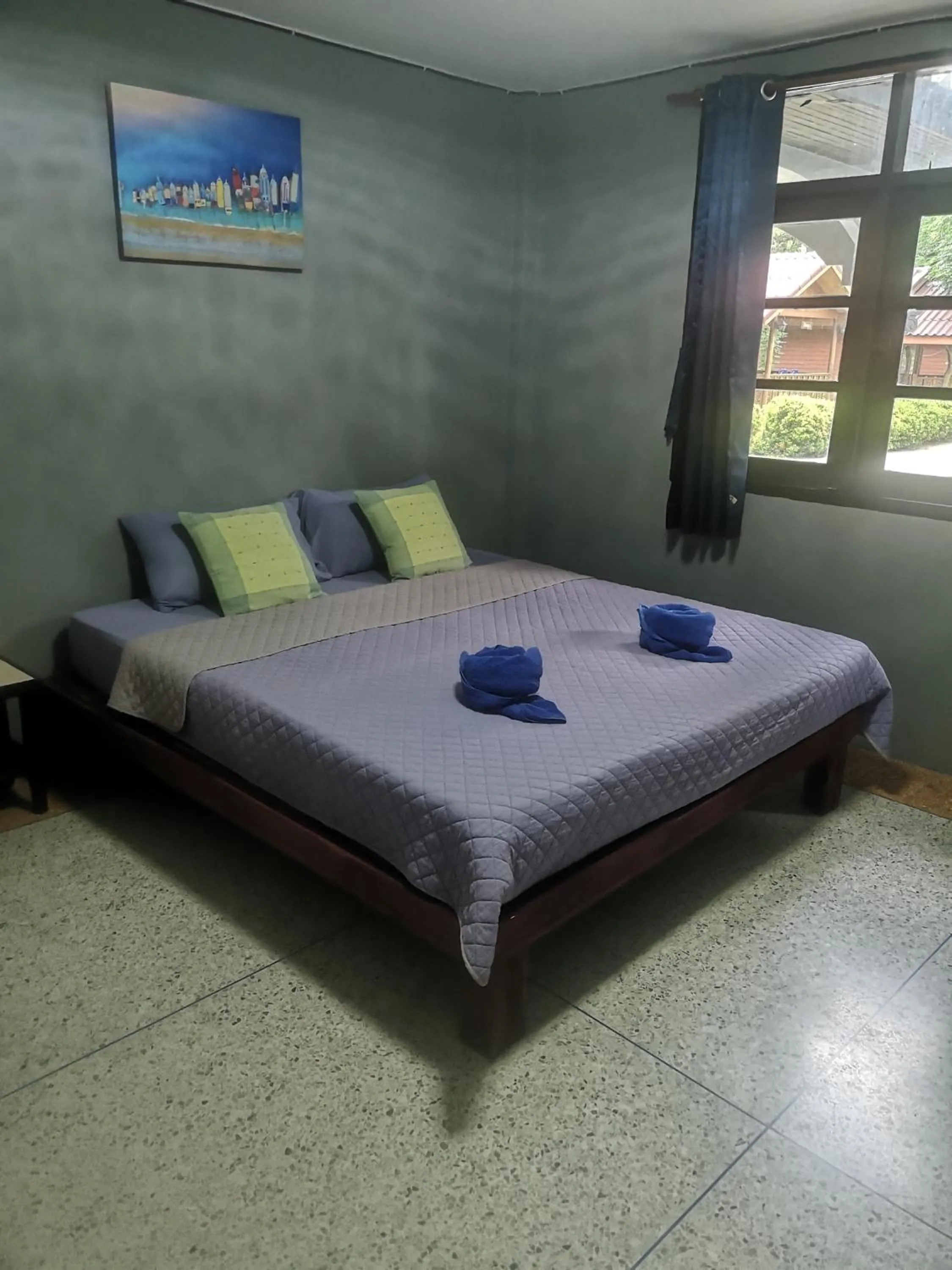 Bed in Buasawan Resort & Restaurant